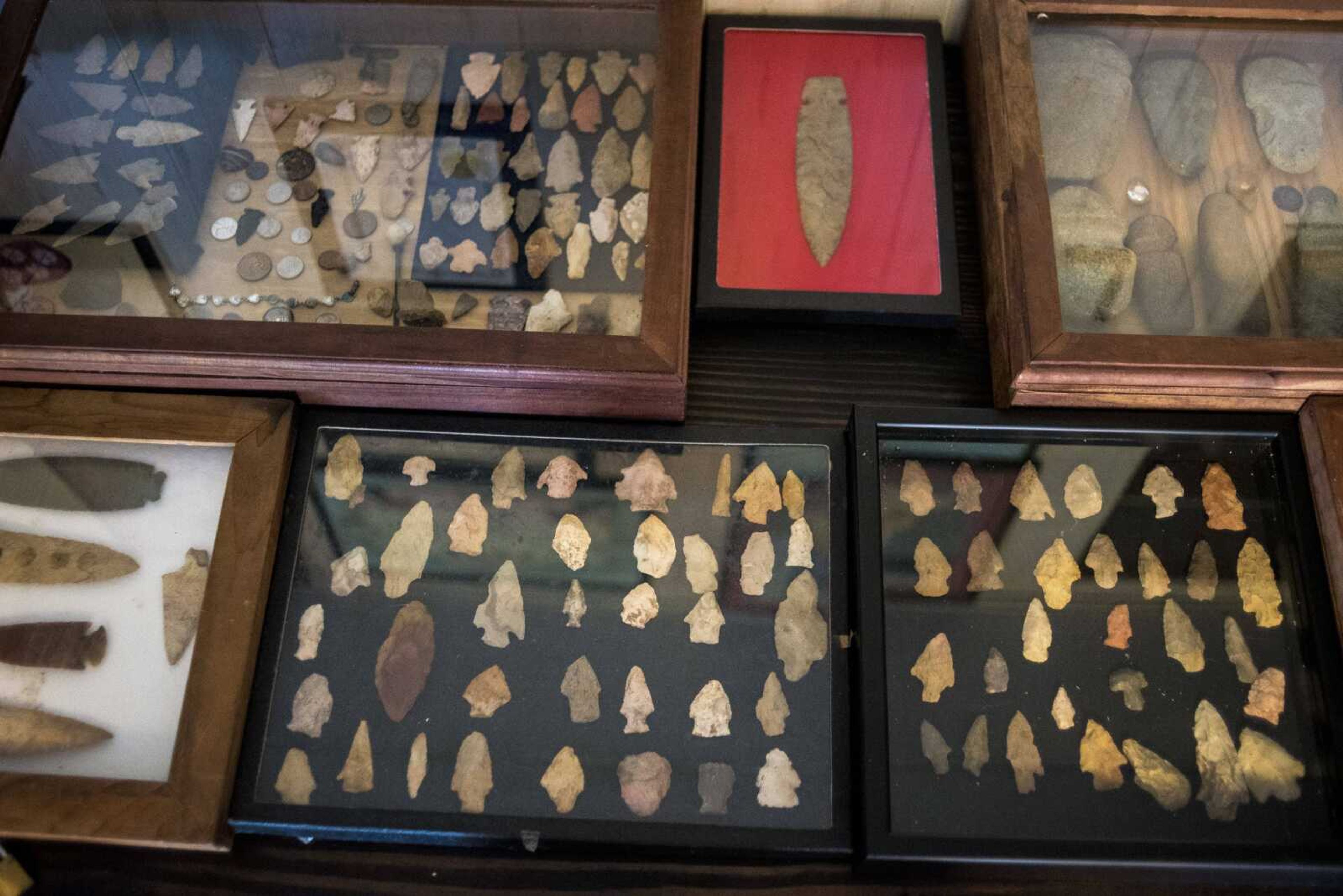 A variety of over 300 arrowheads are seen part of Emmett "Butch" Bounds' collection Thursday, Nov. 16, in Cape Girardeau.