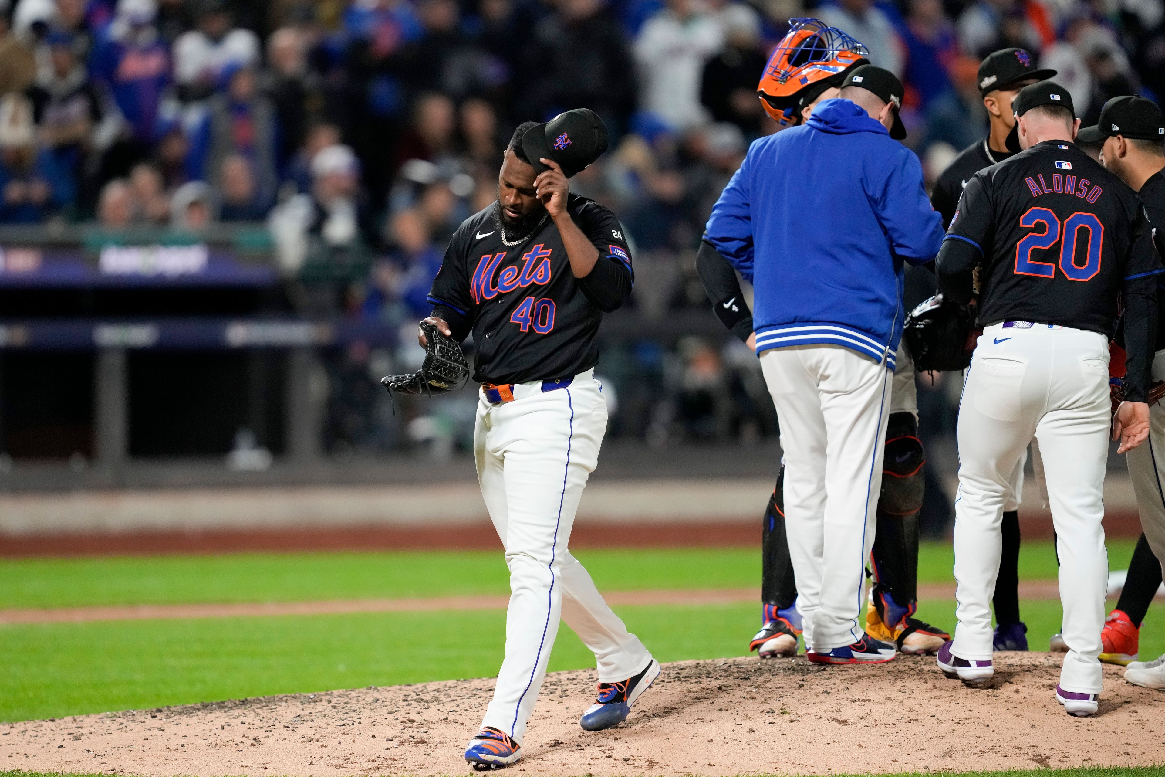 New York Mets' Luis Severino is taken out of the game against the Los Angeles Dodgers during the fifth inning in Game 3 of a baseball NL Championship Series, Wednesday, Oct. 16, 2024, in New York. (AP Photo/Ashley Landis)