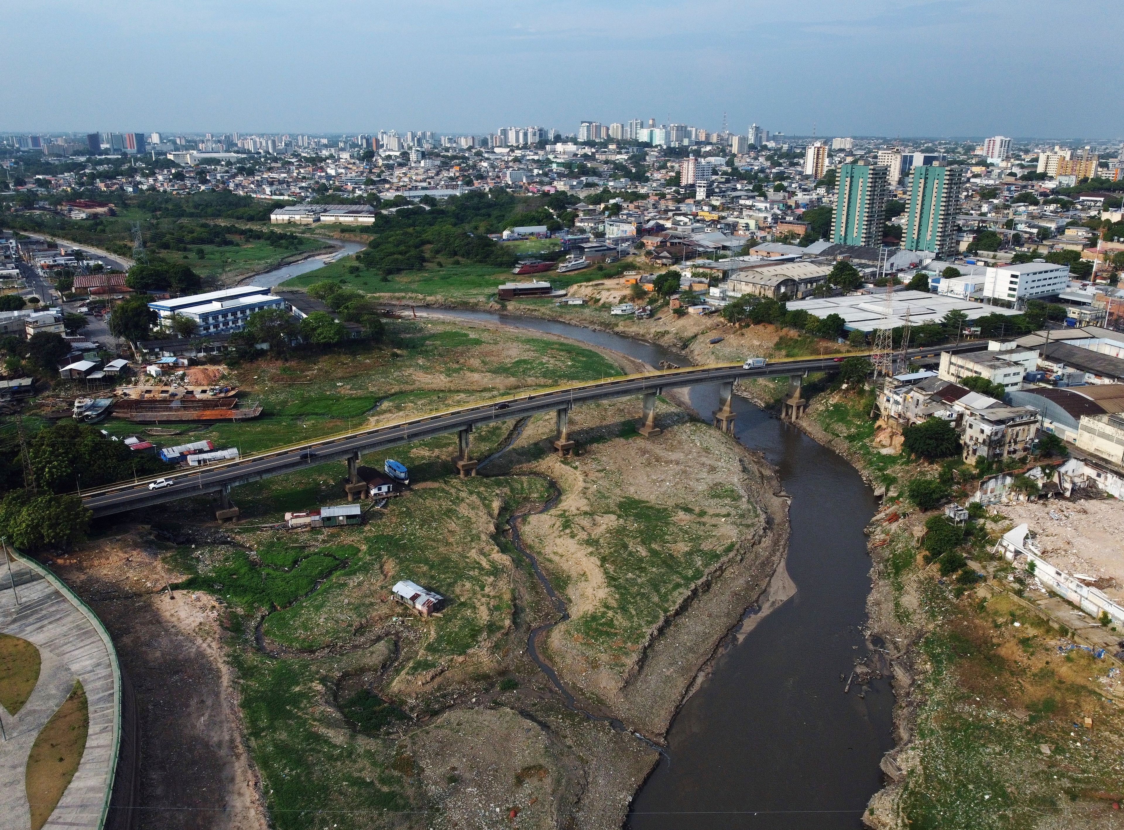 Part of the Sao Raimundo that connects to the Negro River is visible amid a severe drought in Manaus, state of Amazonas, Brazil, Wednesday, Sept. 25, 2024. (AP Photo /Edmar Barros)