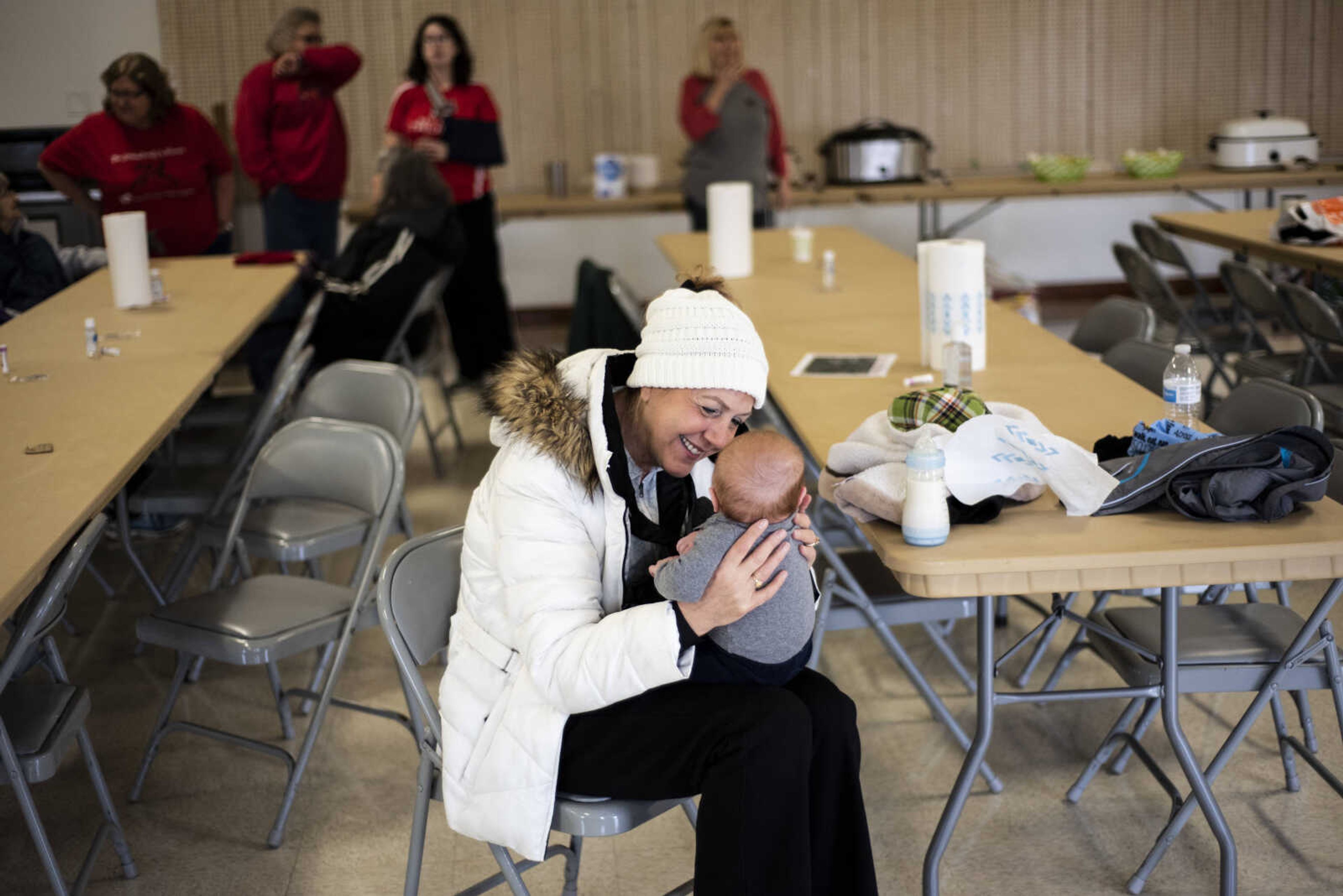 Polly Holten talks to her 3-month-old grandson, Luke Beevor, Jr., as she watches him during the Resolution Challenge Tuesday, Jan. 1, 2019, at Arena Park in Cape Girardeau.