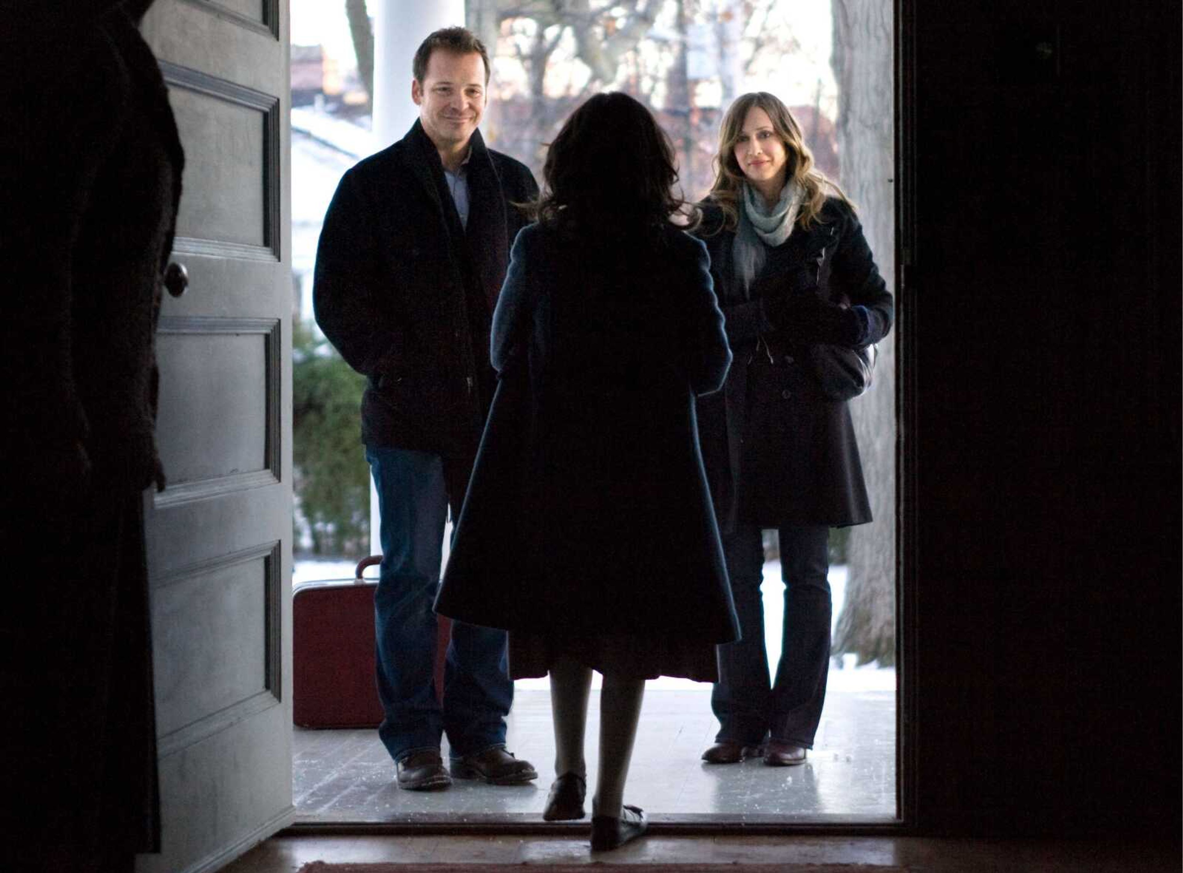 In this film publicity image released by Warner Bros., actors from left, Peter Sarsgaard, Isabelle Fuhrman and  Vera Farmiga are shown in a scene from, "Orphan." (AP Photo/Warner Bros., Rafy) ** NO SALES **