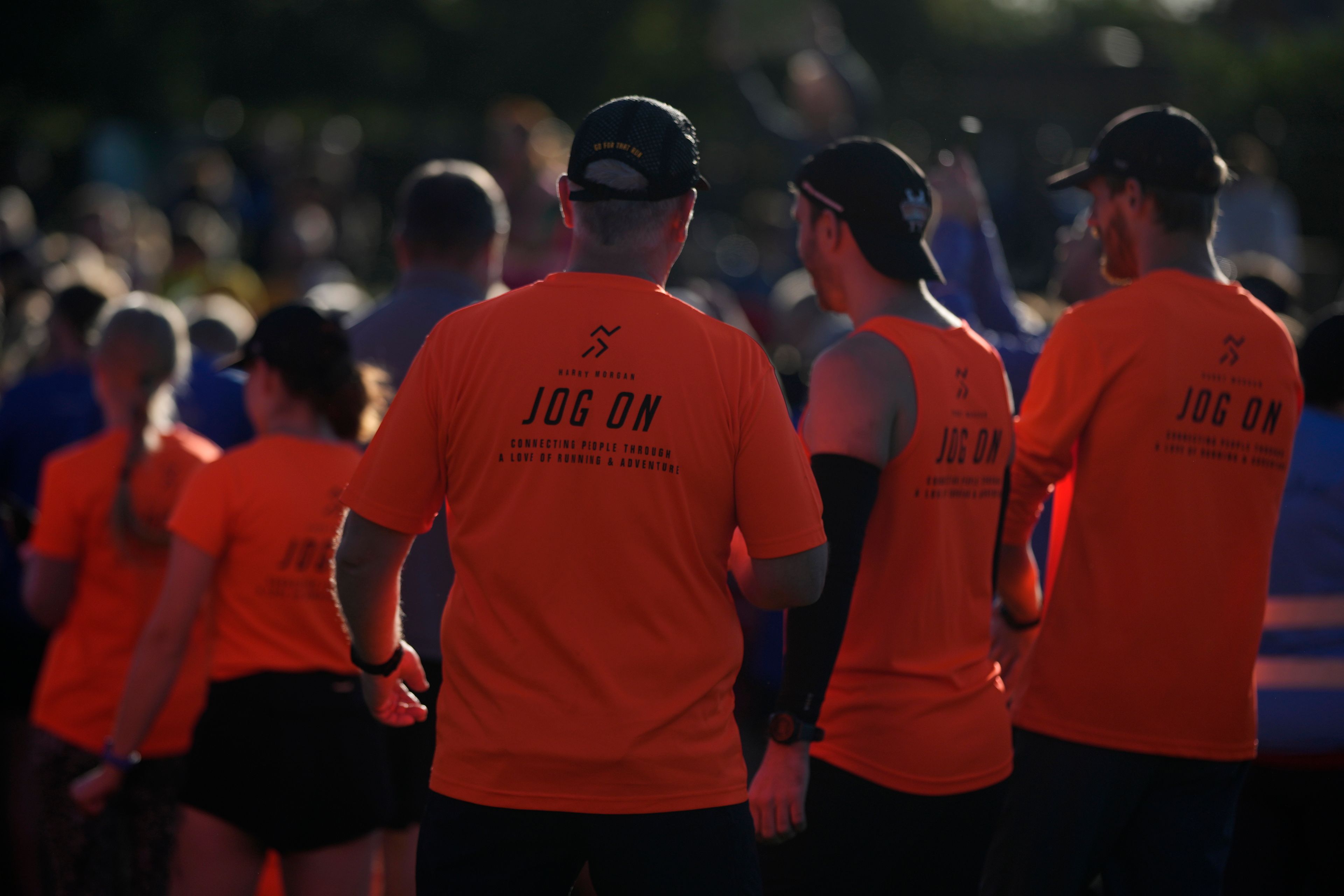 Competitors listen to the briefing before the start of the parkrun event in Bushy Park, southwest London, Saturday, Sept. 28, 2024. (AP Photo/Alastair Grant)