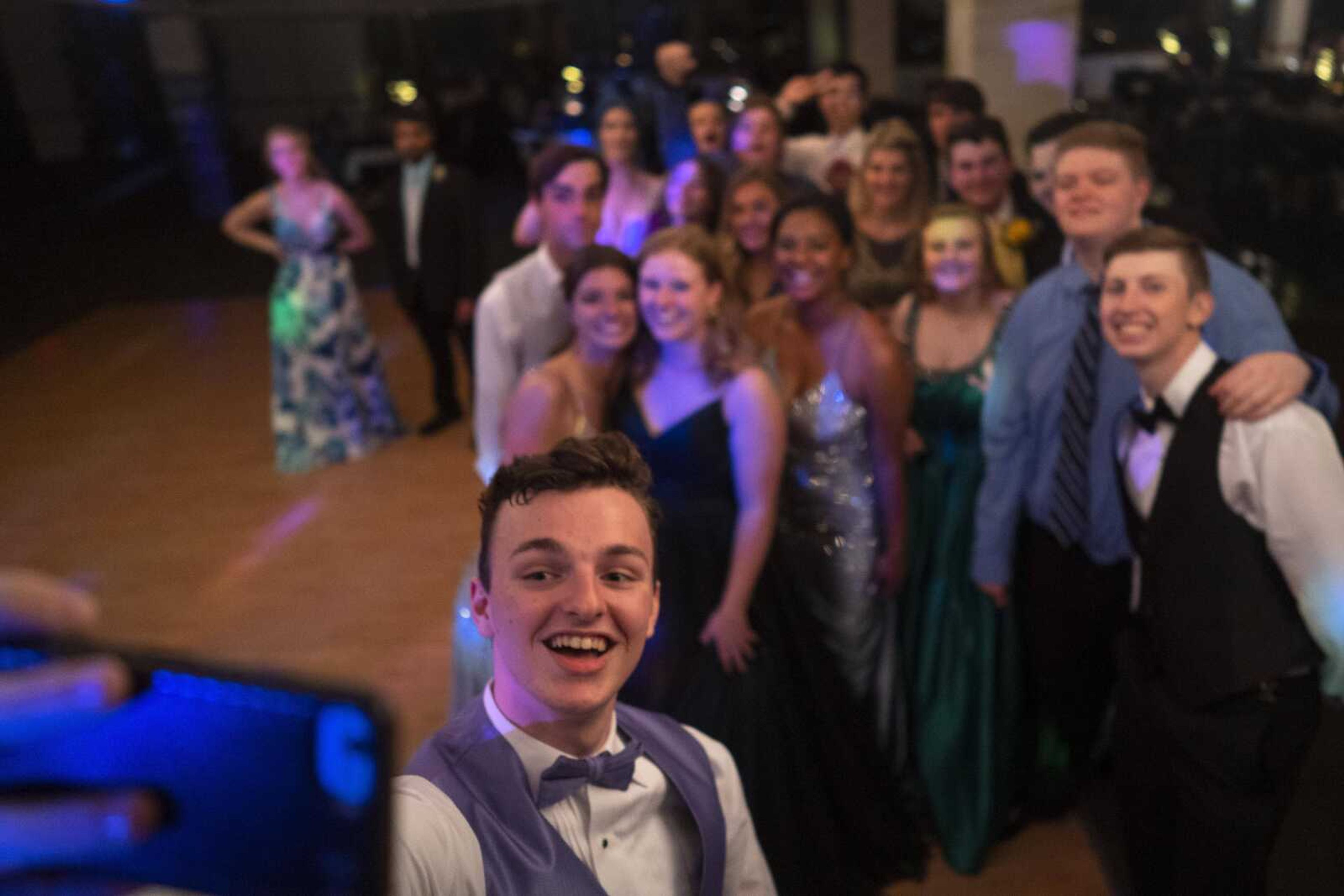 Sam Bonney takes a selfie with other students during the Saxony Lutheran prom Saturday, April 26, 2021, at  the Elks Lodge in Cape Girardeau.