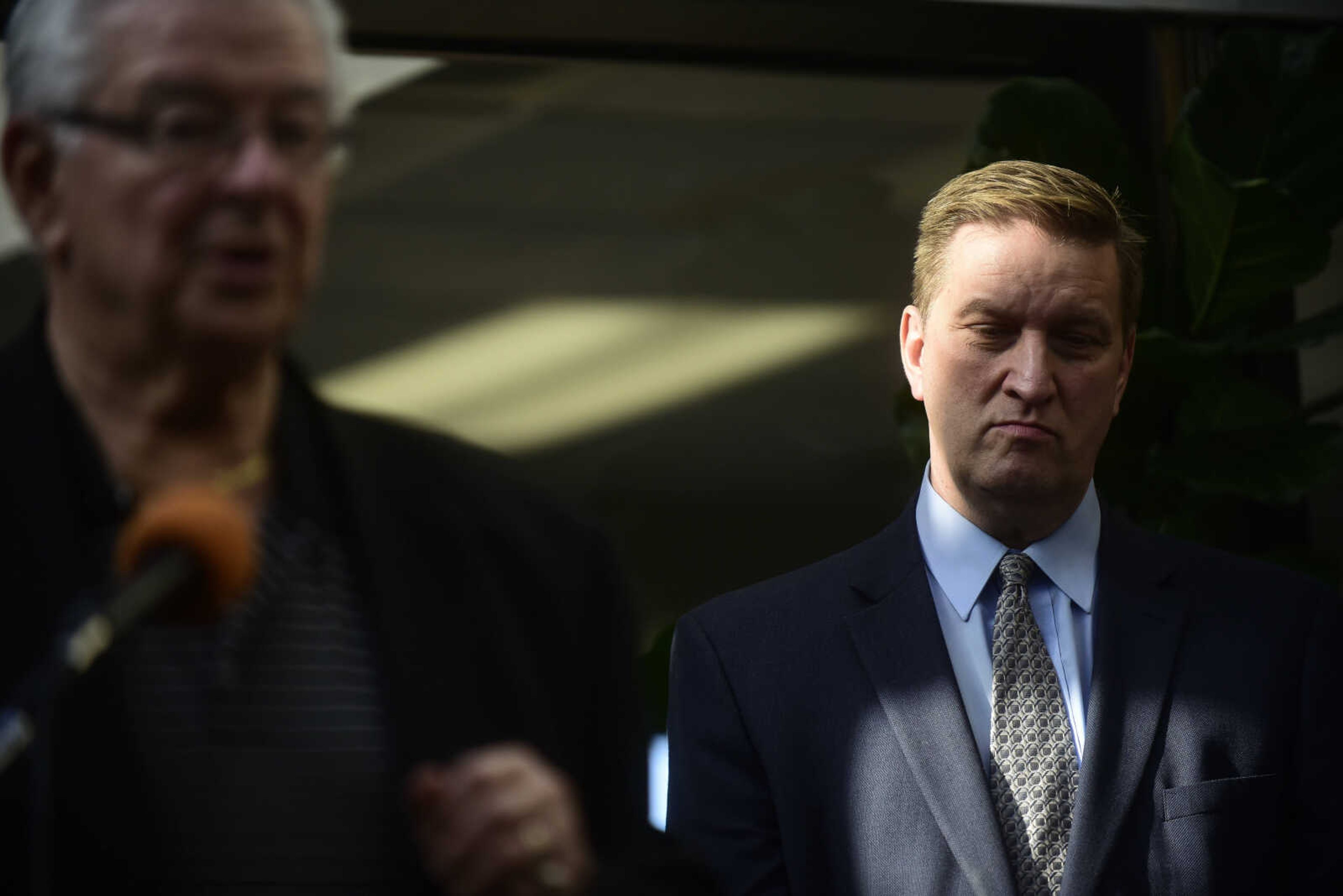 Cape Girardeau City Manager Scott Meyer listens to Mayor Harry Rediger speak during the inaugural trip to Chicago on a CRJ200 airplane with SkyWest Friday, Dec. 1, 2017 at Cape Girardeau Regional Airport in Cape Girardeau.