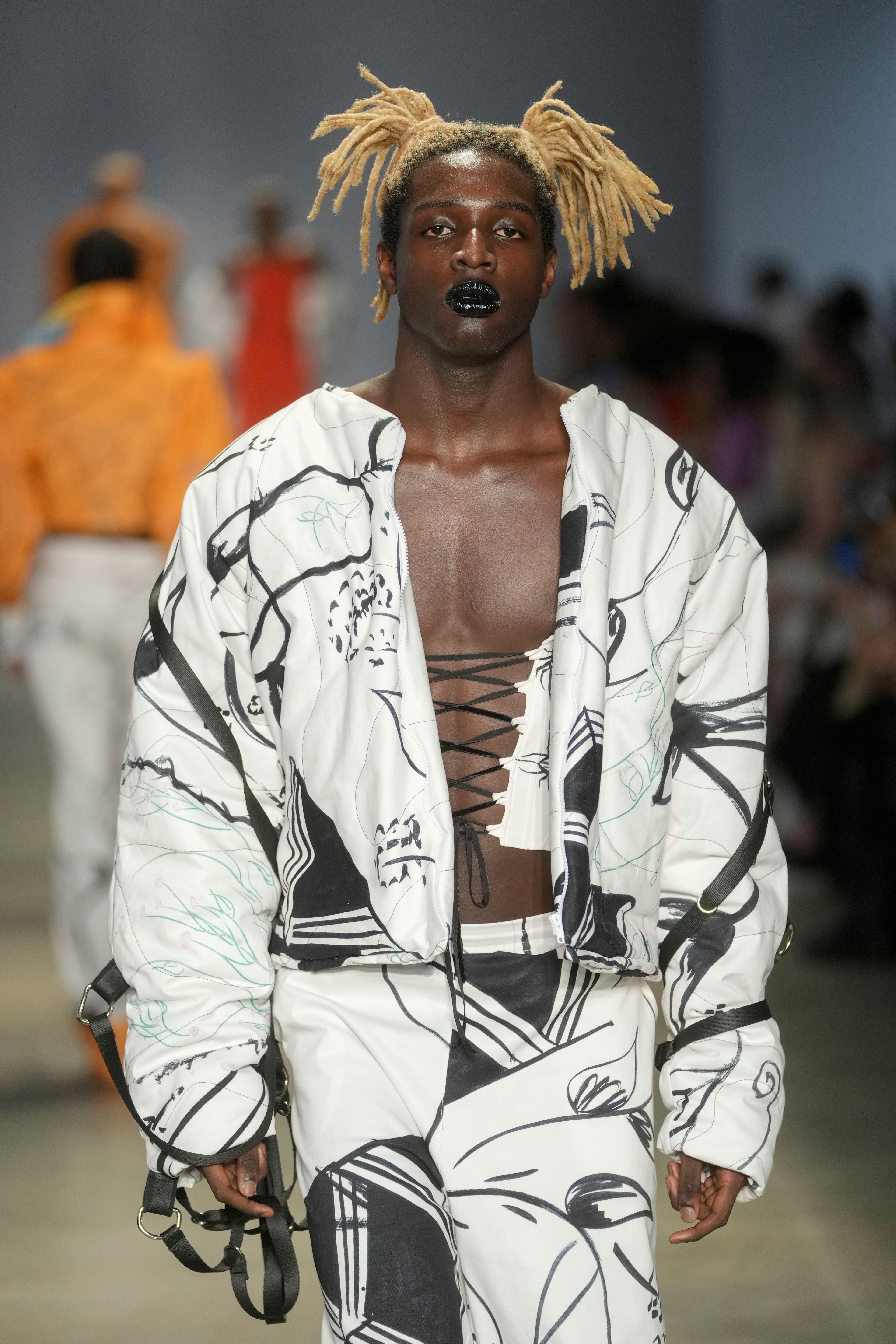 A model wears a creation from the Cria Costura collection during Sao Paulo Fashion Week in Sao Paulo, Thursday, Oct. 17, 2024. (AP Photo/Andre Penner)