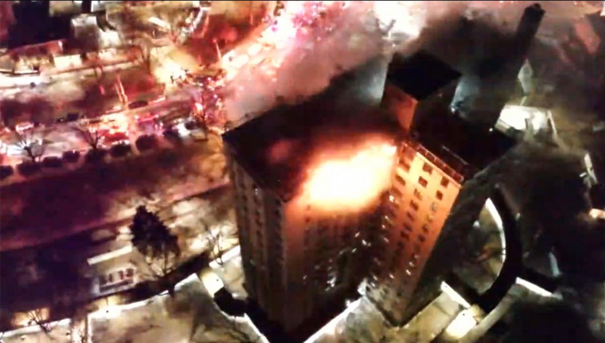 Firefighters battle blaze on top floors of Bronx apartment