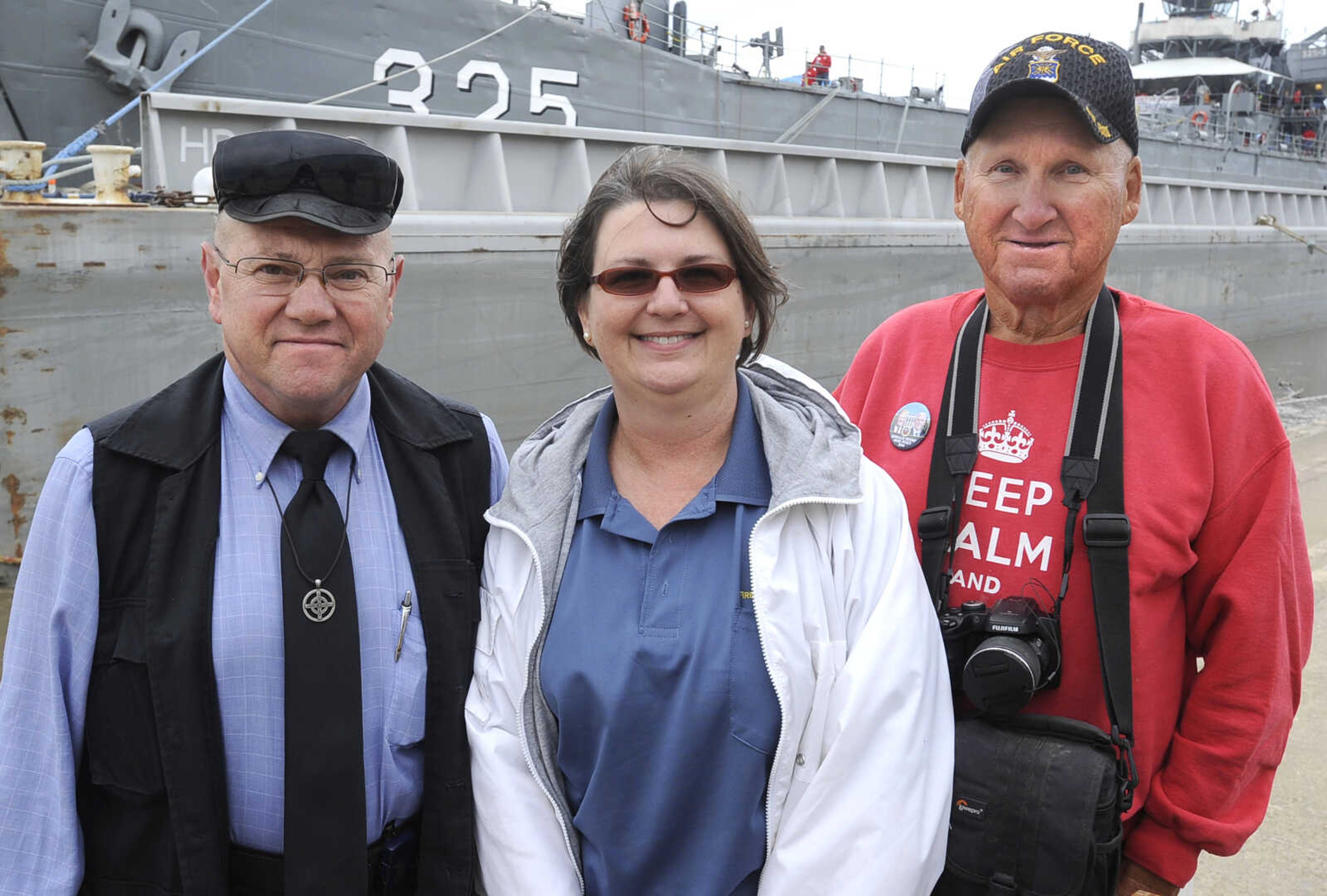 Gene Colyer, left, Carrie Whitsel and David Hente pose for a photo Thursday, Sept. 29, 2016 at the USS LST 325 docked at Riverfront Park in Cape Girardeau.