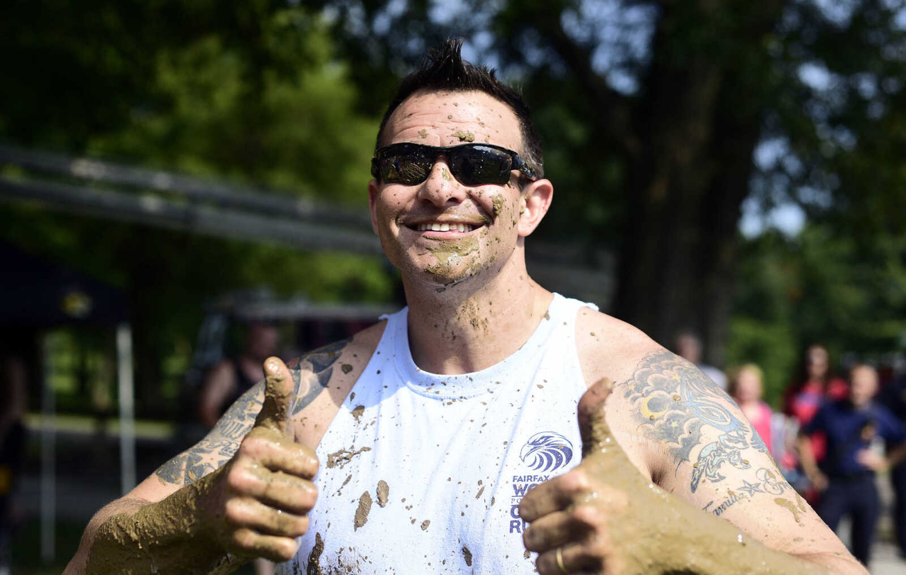 Joey Hann poses for a portrait while playing mud volleyball during the Fourth of July celebration on Tuesday at Jackson City Park.