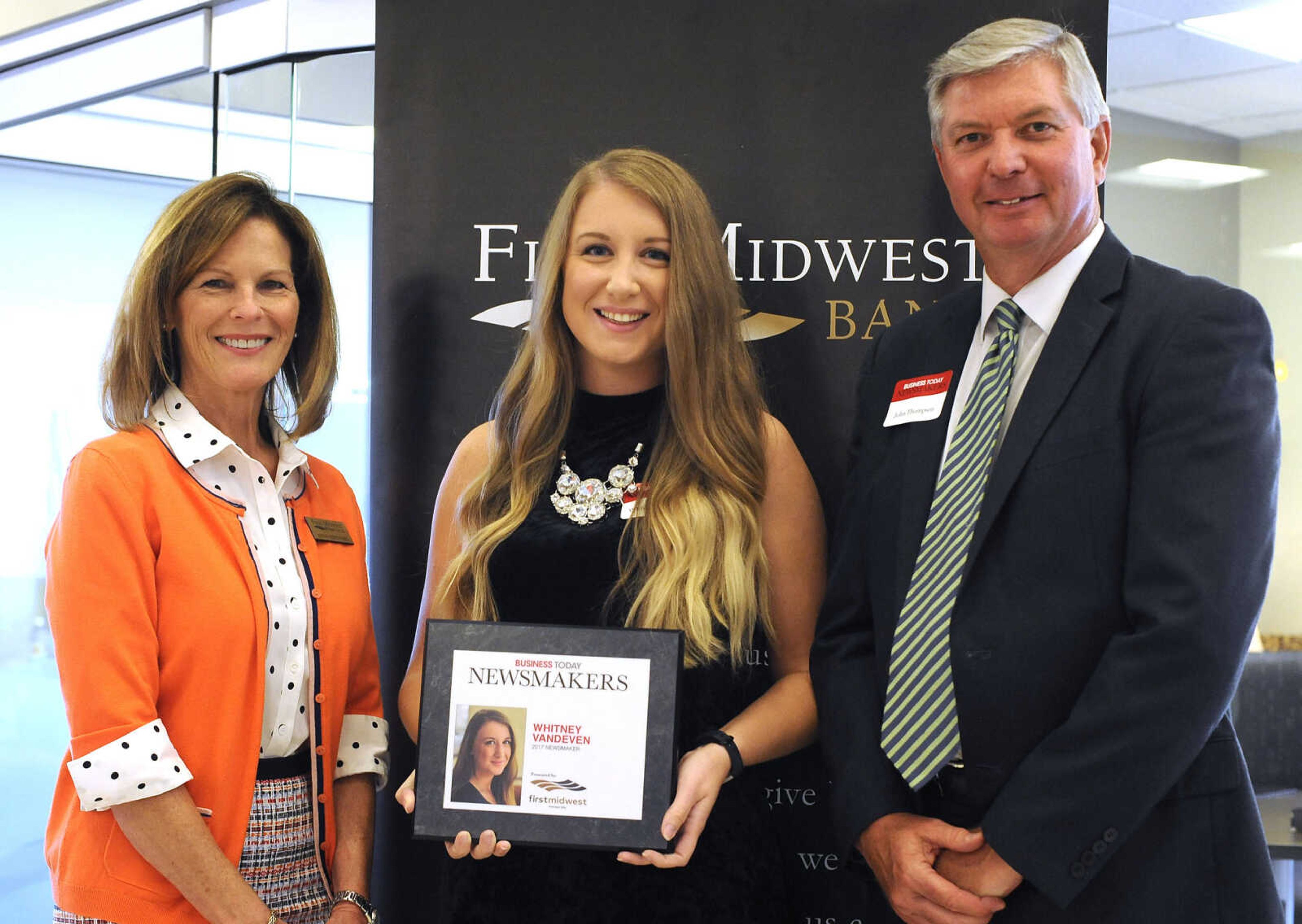 FRED LYNCH ~ flynch@semissourian.com
Whitney Vandeven poses for a photo with Kathy Bertrand, First Midwest Bank community bank president, Cape Girardeau, and John N. Thompson, First Midwest Bank community bank president, Jackson, Wednesday, Sept. 6, 2017 during the Business Today Newsmakers awards reception at First Midwest Bank in Cape Girardeau.