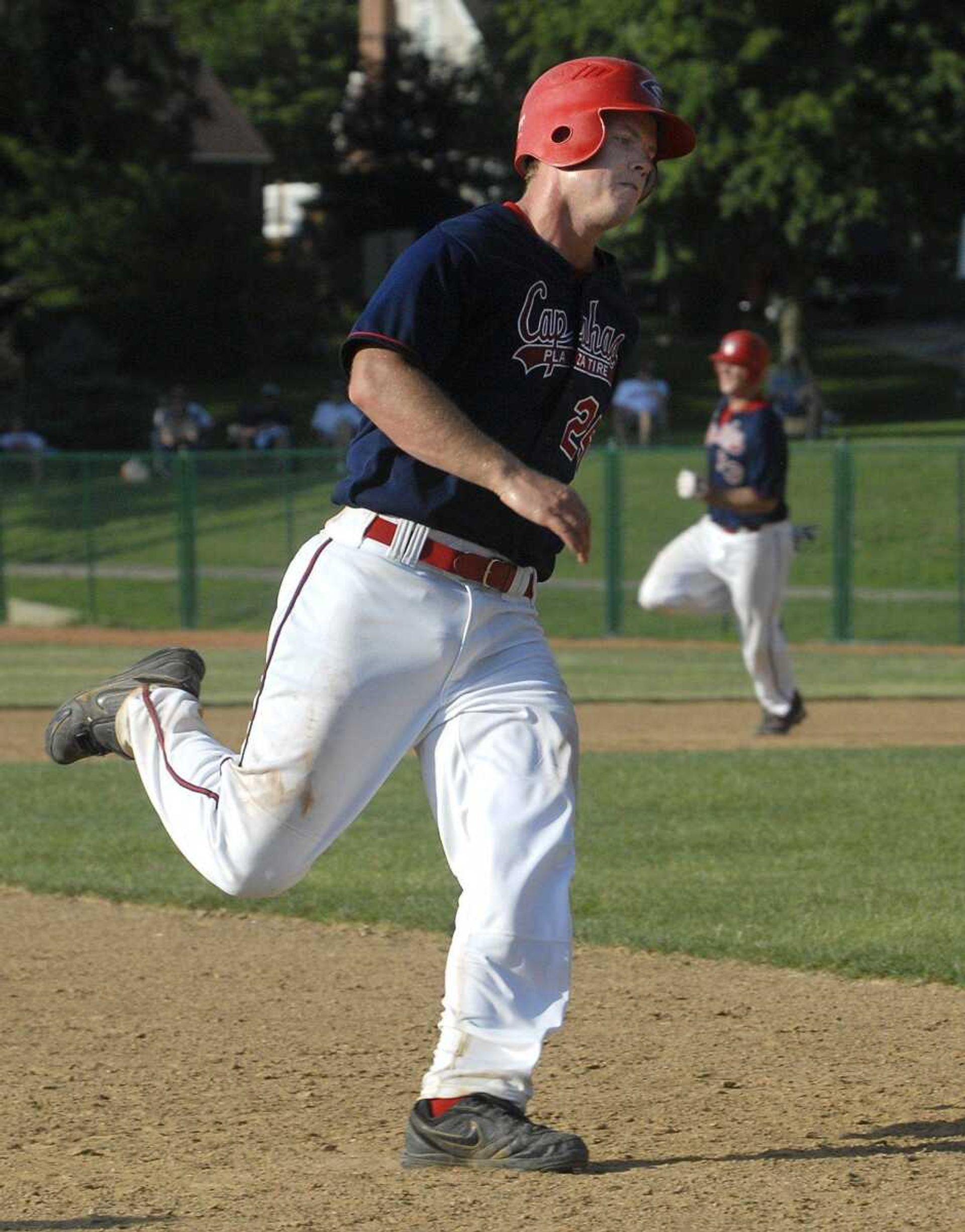 Capahas baserunner Sean Bard heads for home on a double by Matt Wagner against the Riverdogs in the fifth inning of the first game Sunday at Capaha Field. (Fred Lynch)