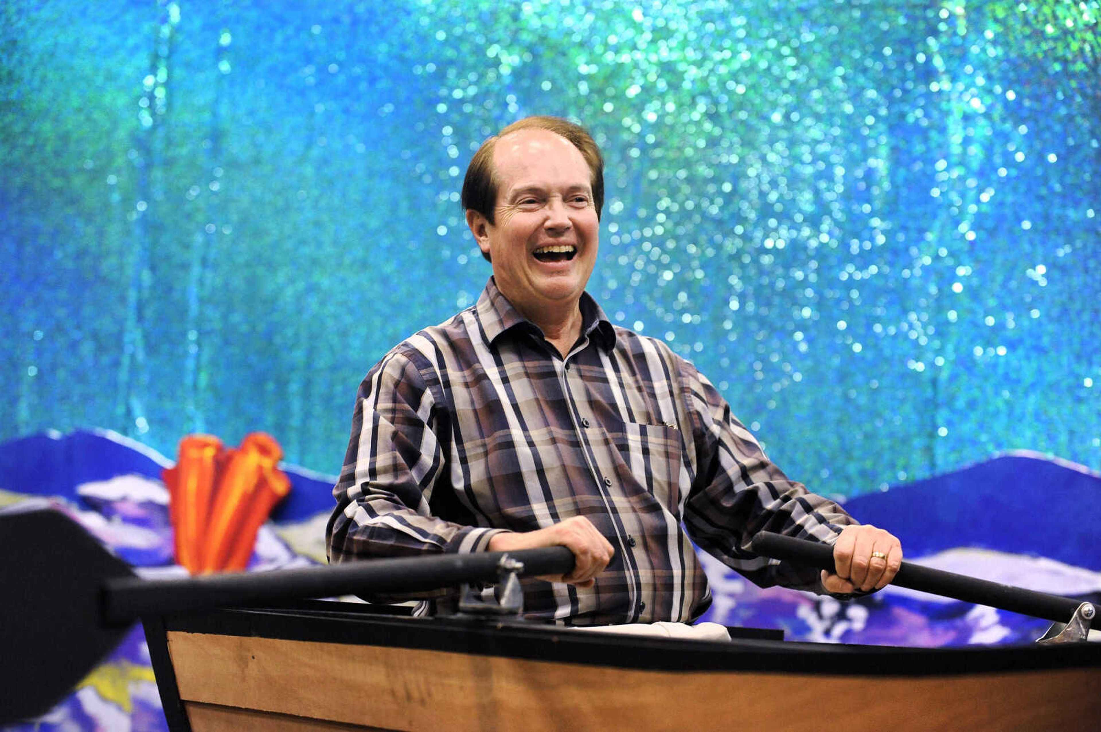 LAURA SIMON ~ lsimon@semissourian.com

Mike Dumey, choir teacher and director of Cape Central Junior High School's production of 'The Little Mermaid', navigates his way across the stage in the prop boat used in the musical, Tuesday, March 1, 2016.