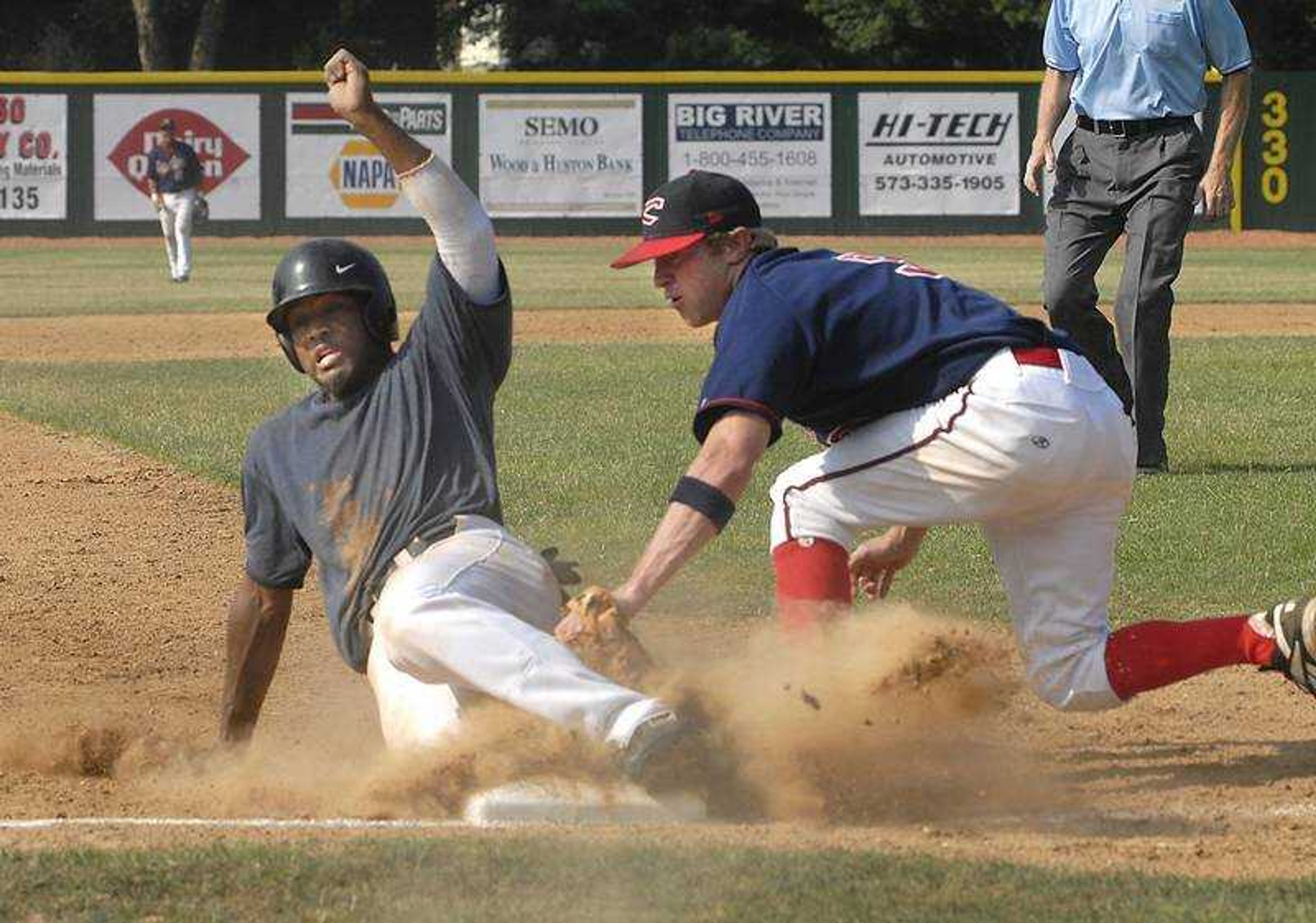 FRED LYNCH ~ flynch@semissourian.com
Capahas shortstop Zach Borowiak tagged out Pine Bluff's Jerome McCullum at third base during the fourth inning Saturday at Capaha Field.