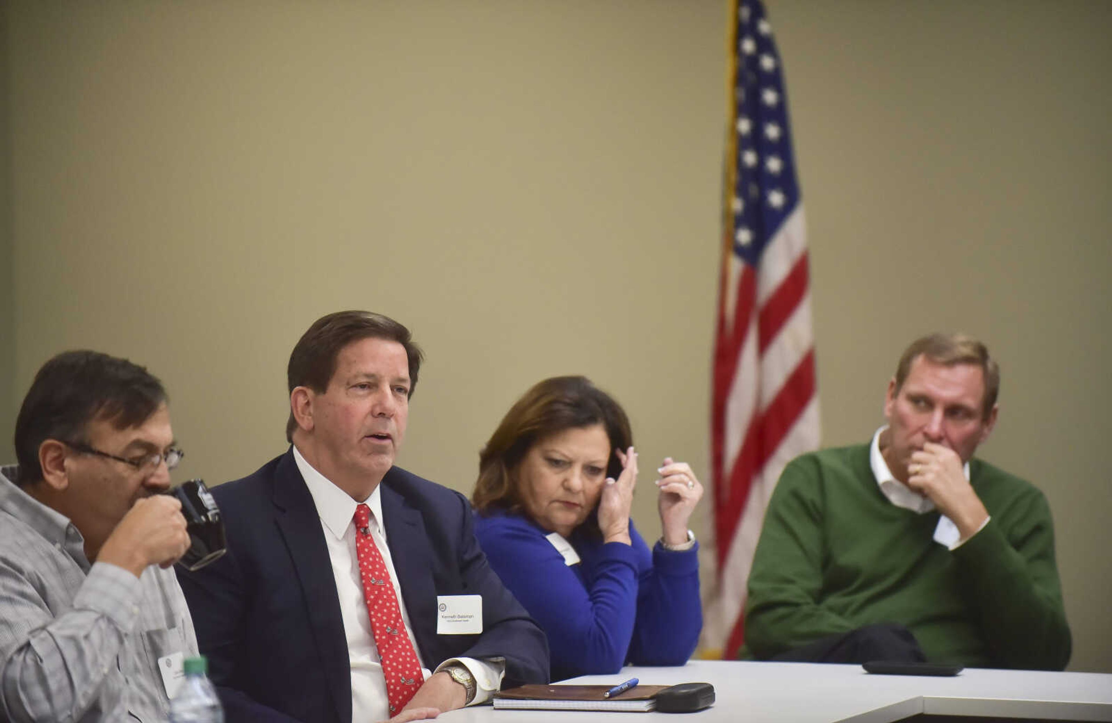 Kenneth Bateman, CEO of SoutheastHEALTH, asks a question to U.S. Rep. Jason Smith during a roundtable discussion with area health-care professionals Wednesday in Cape Girardeau.