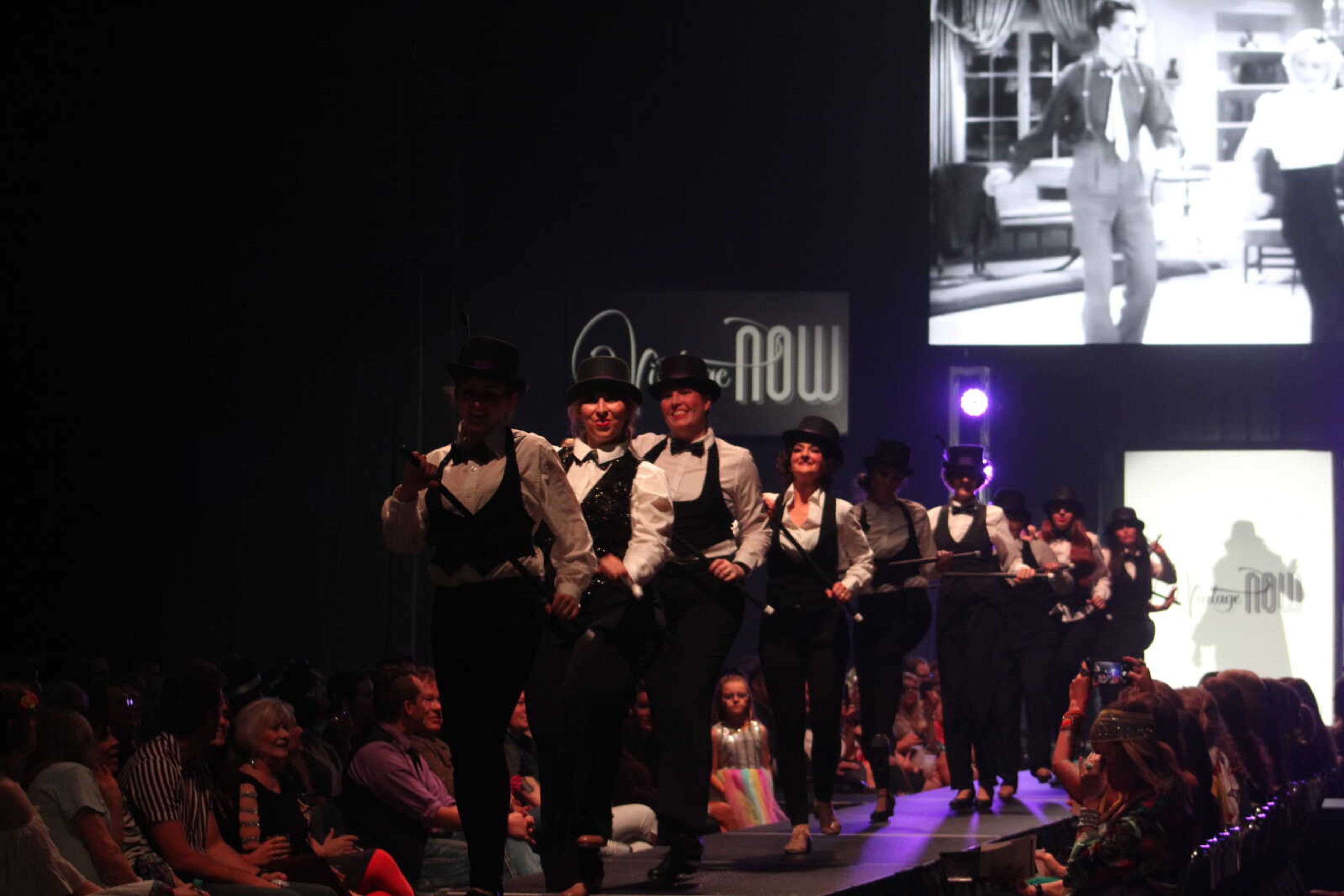 Community women perform as models and dancers in the 11th VintageNOW fashion show Saturday, Oct. 9, 2021, at the Show Me Center in Cape Girardeau.