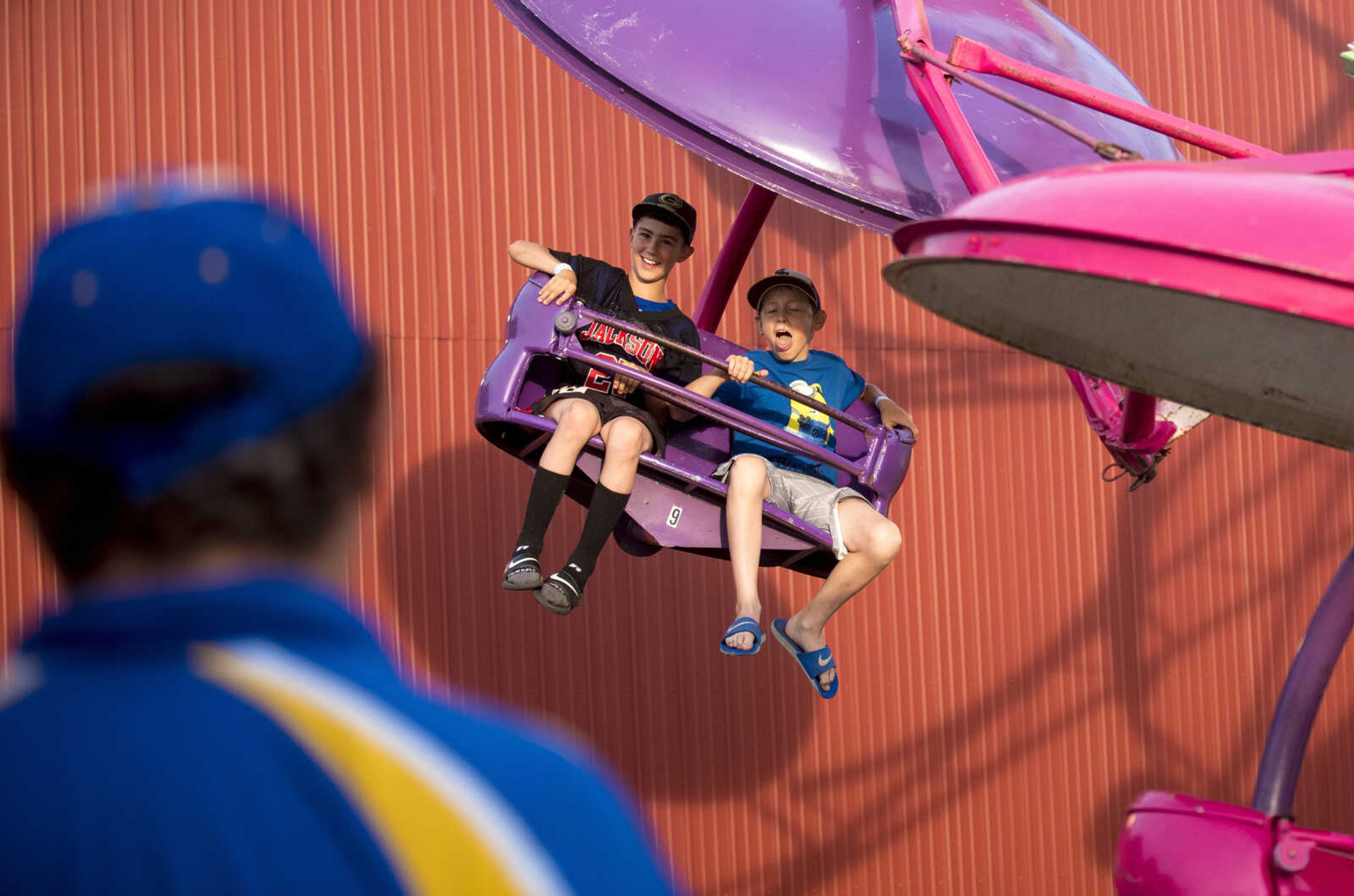 Kids enjoy a ride during the 41st annual Mid-Summer Festival Friday, June 16, 2017 at Scott City Park.