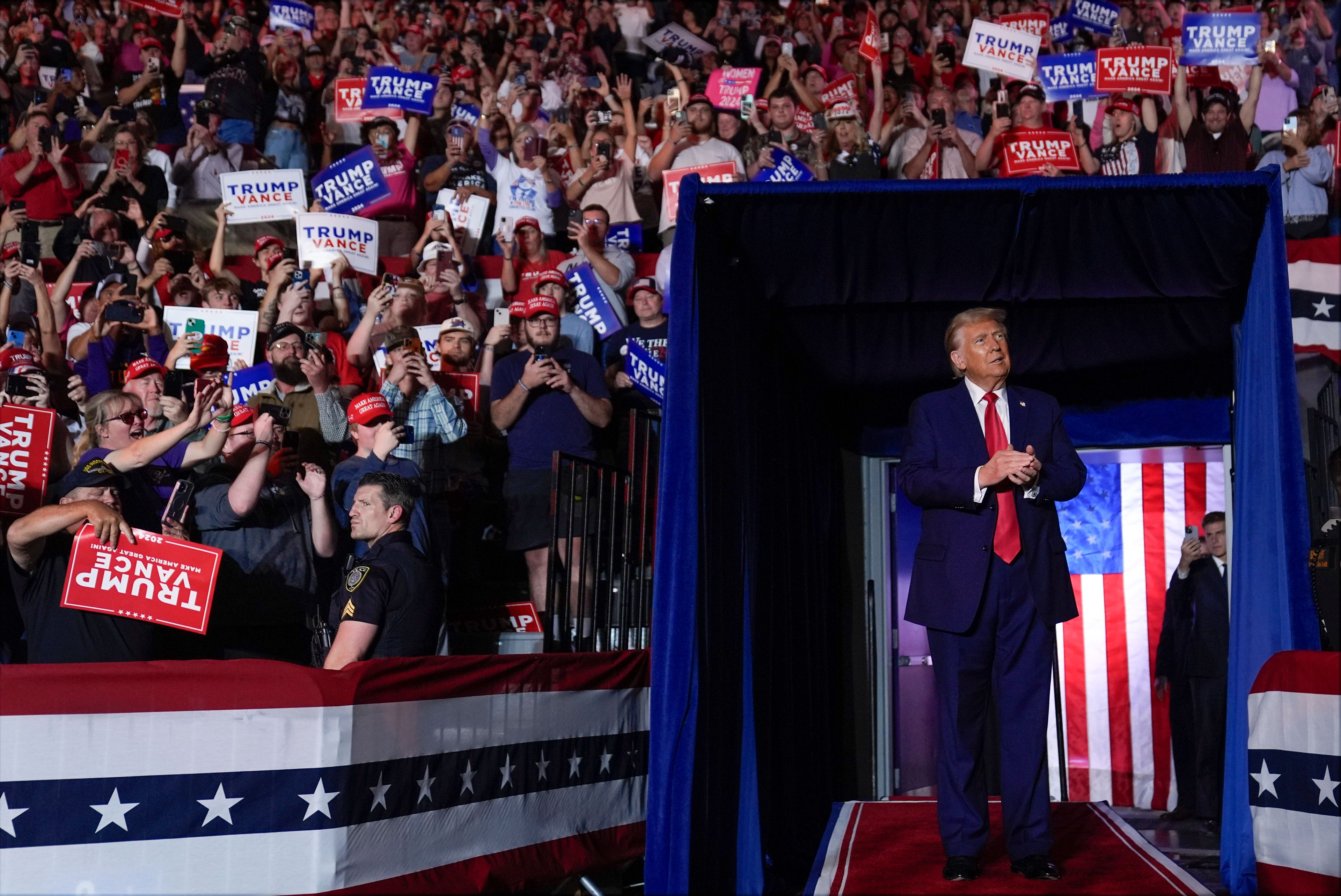 Republican presidential nominee former President Donald Trump arrives for a campaign rally at Williams Arena at Mignes Coliseum, Monday, Oct. 21, 2024, in Greenville, N.C. (AP Photo/Evan Vucci)