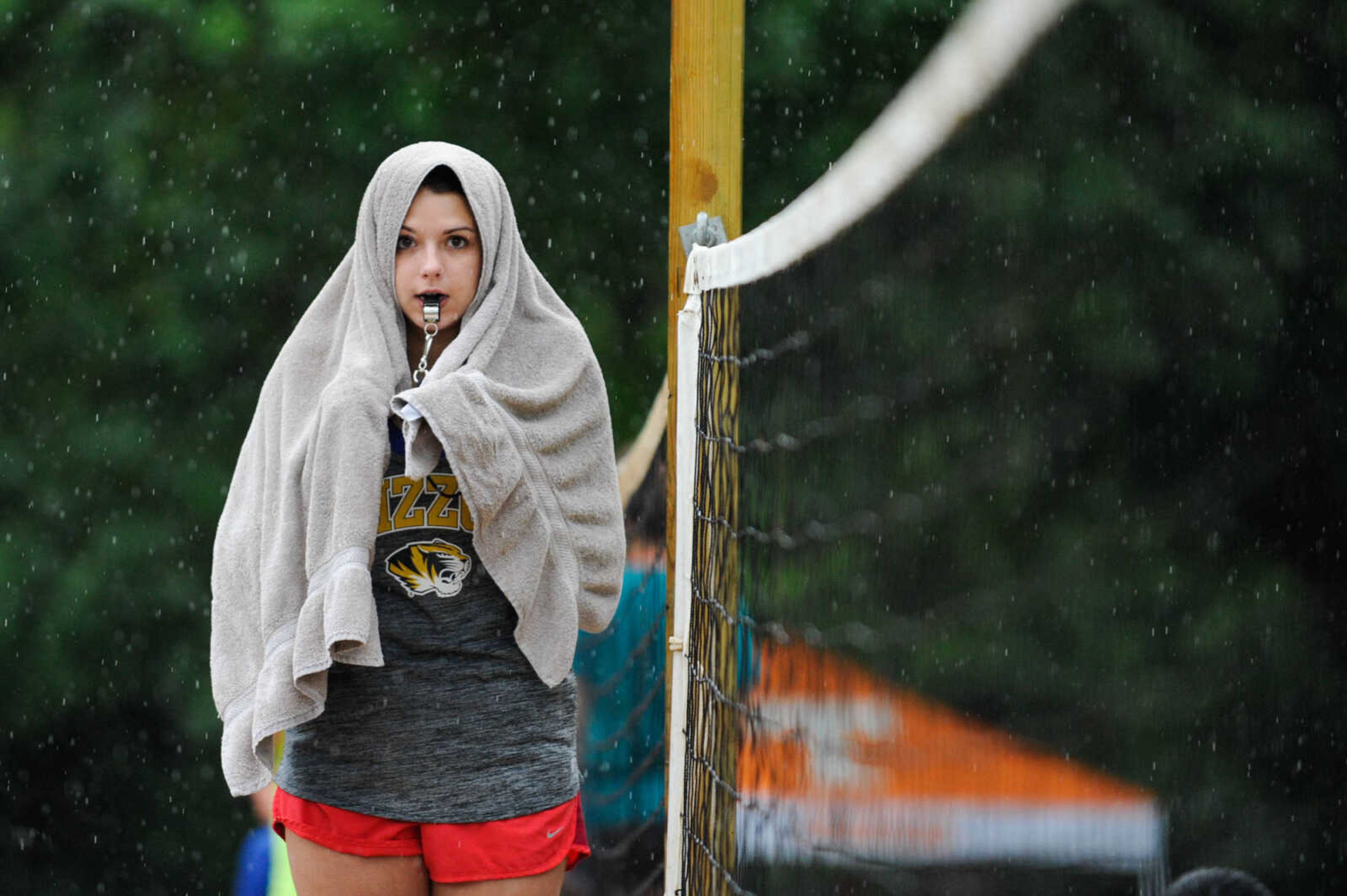 GLENN LANDBERG ~ glandberg@semissourian.com

A referee watches over the mud volleyball tournament during the Fourth of July celebration Monday, July 4, 2016 at Jackson City Park.