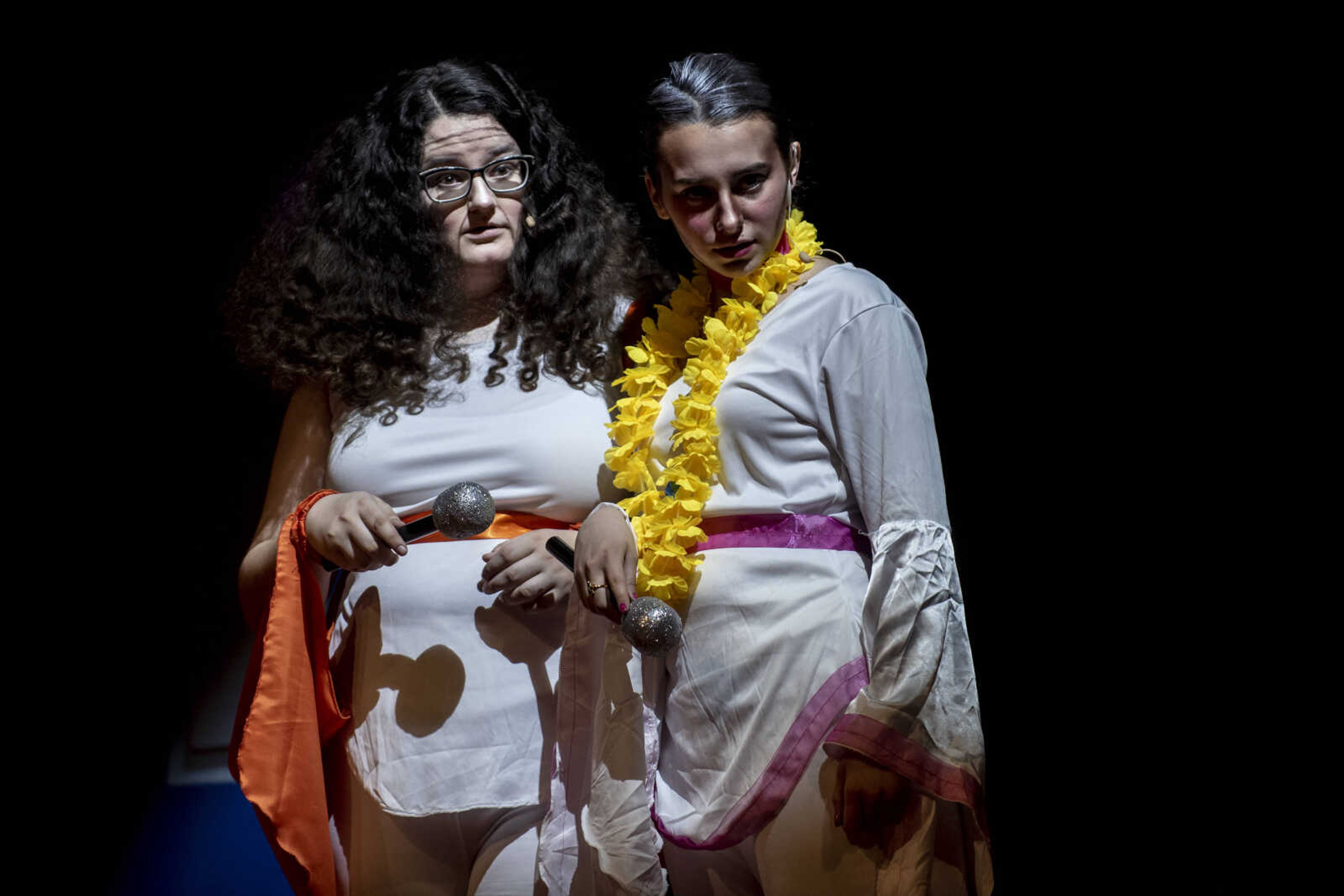 From left, Grace Goeckeler and Morgan Green perform their respective roles of Rosie Mulligan and Tanya Chesam-Leigh during the media night of Cape Central High School's spring musical production of "Mamma Mia!" Wednesday, April 10, 2019, in Cape Girardeau.