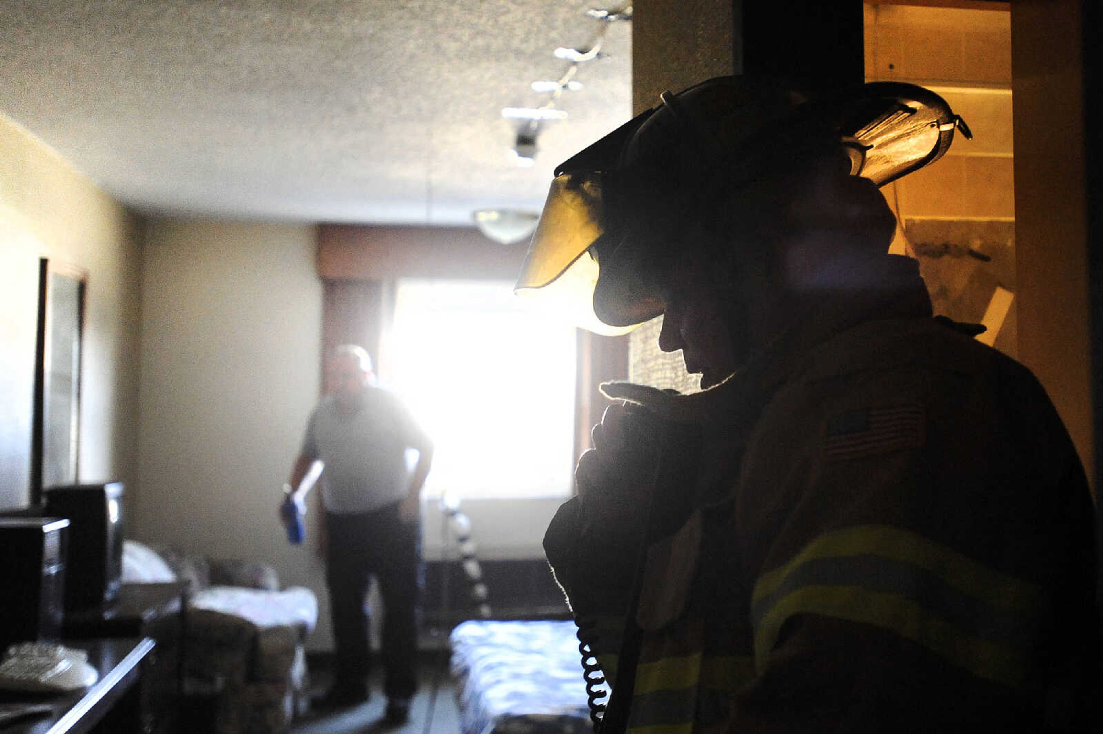 LAURA SIMON ~ lsimon@semissourian.com

Battalion Chief Mike Ramsey with the Cape Girardeau Fire Department prepares for the live burn demonstration to test the Plumis automist system inside one the remaining rooms of Drury Lodge, Thursday, Jan. 28, 2016. The fire department put on a demonstration to compare and test different fire suppression techniques.