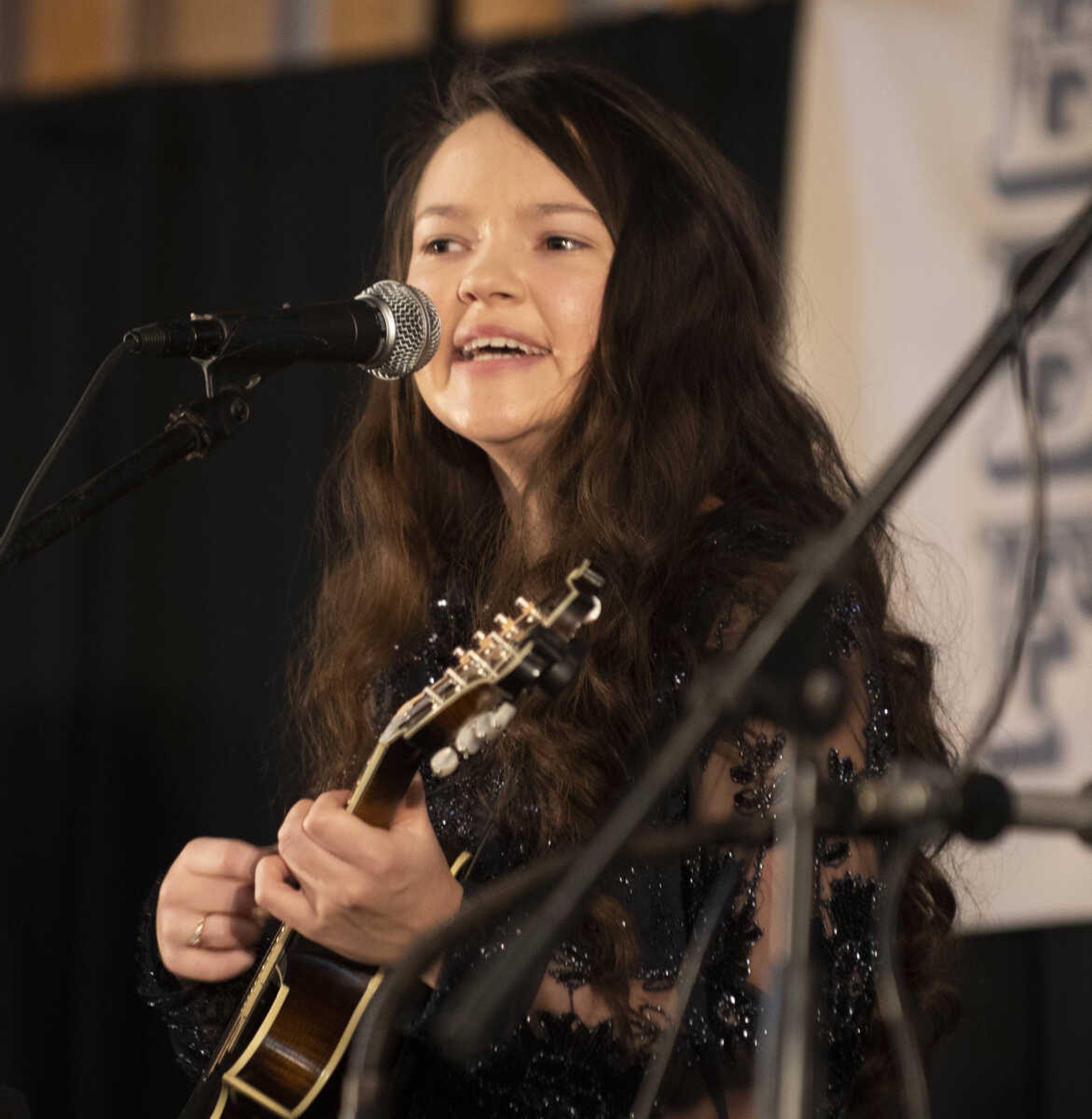 Carina Baker of Birch Tree, Missouri, 17, performs with her mother and brothers at the Bootheel Bluegrass Festival on Friday, Jan. 25, 2019, at the Bavarian Halle in Fruitland. The festival continues Saturday with more bluegrass.