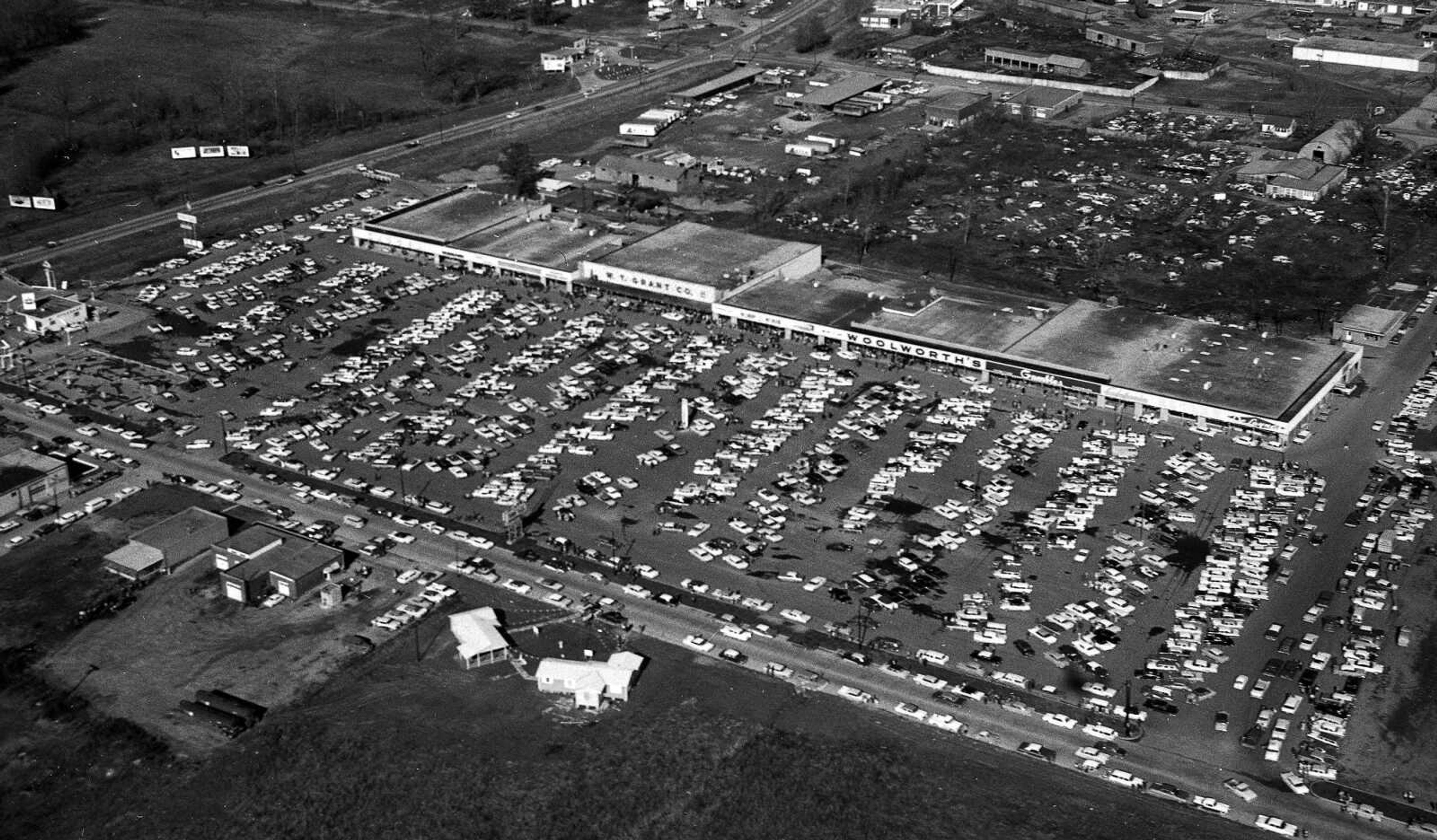 The Town Plaza Shopping Center is shown soon after it opened in August 1960 with prominent stores, including Kroger, W.T. Grant Co., Woolworth's and Gambles. William Street is below with Kingshighway at left and Independence Street at the top. (Southeast Missourian file)