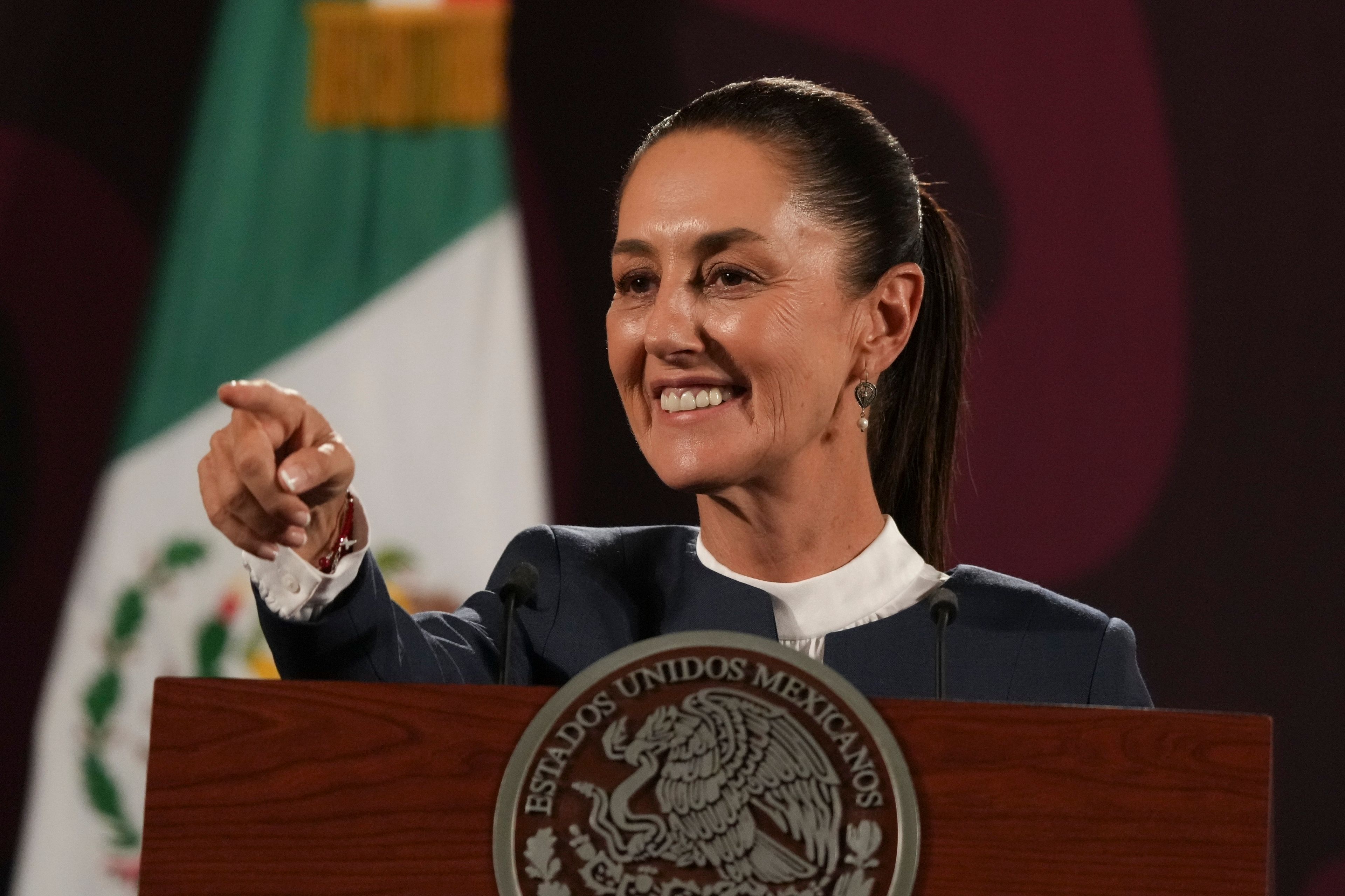 FILE - President-elect Claudia Sheinbaum choses a reporter at the early morning daily press briefing, at the National Palace in Mexico City, June 10, 2024. Sheinbaum, a climate scientist and former Mexico City mayor, will be sworn in as Mexico’s first woman president on Oct. 1. (AP Photo/Marco Ugarte, File)