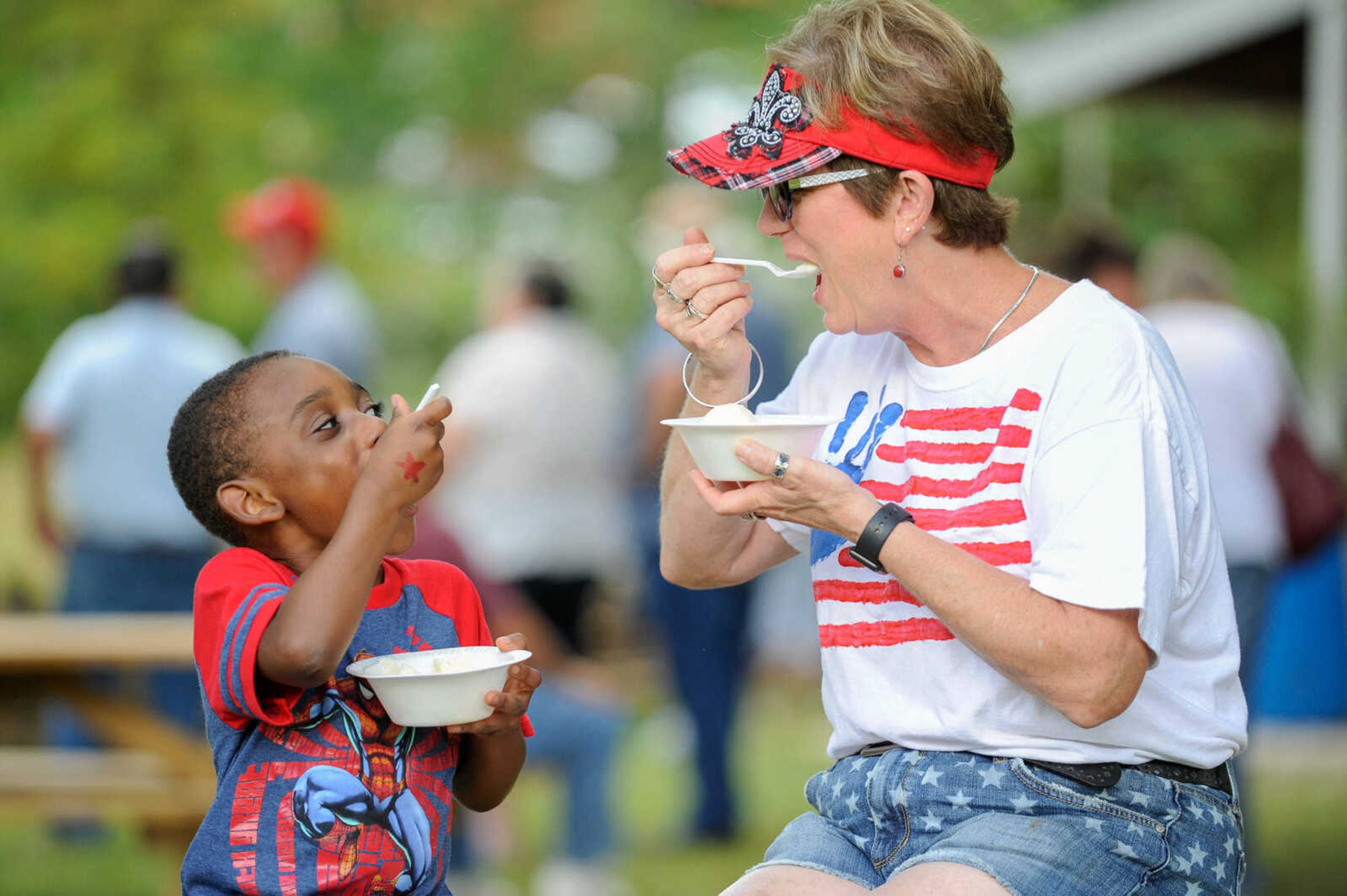 GLENN LANDBERG ~ glandberg@semissourian.com


D.J. Turner and his friend Darlene Bullinger enjoy some homemade ice cream during the the annual parish picnic on Saturday, July 30, 2016 at St. John's Catholic Church in Leopold, Mo.