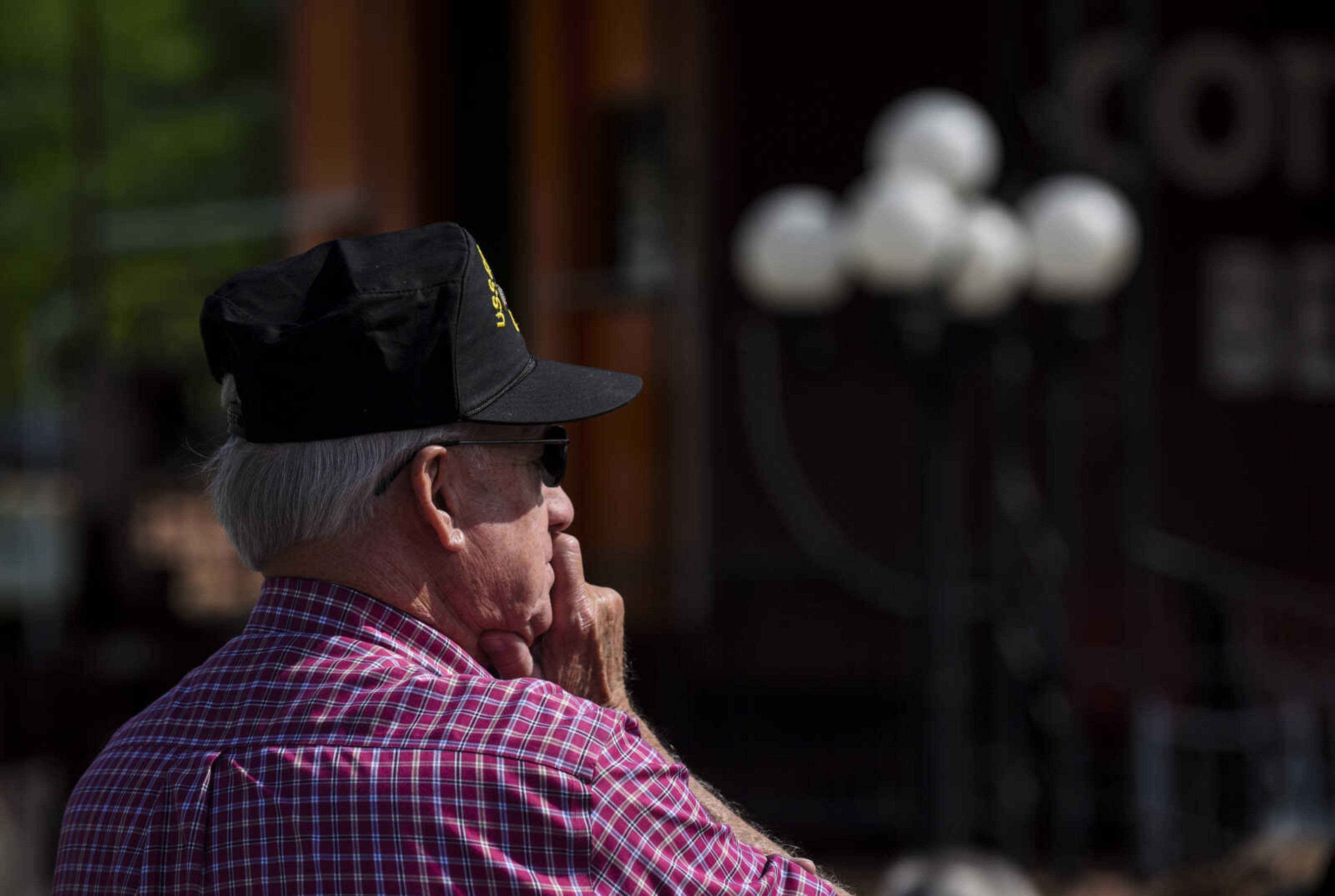 A veteran listens to remarks at the Honoring our Military event Saturday, May 5, 2018, at the Scott City Historical Museum in Scott City.