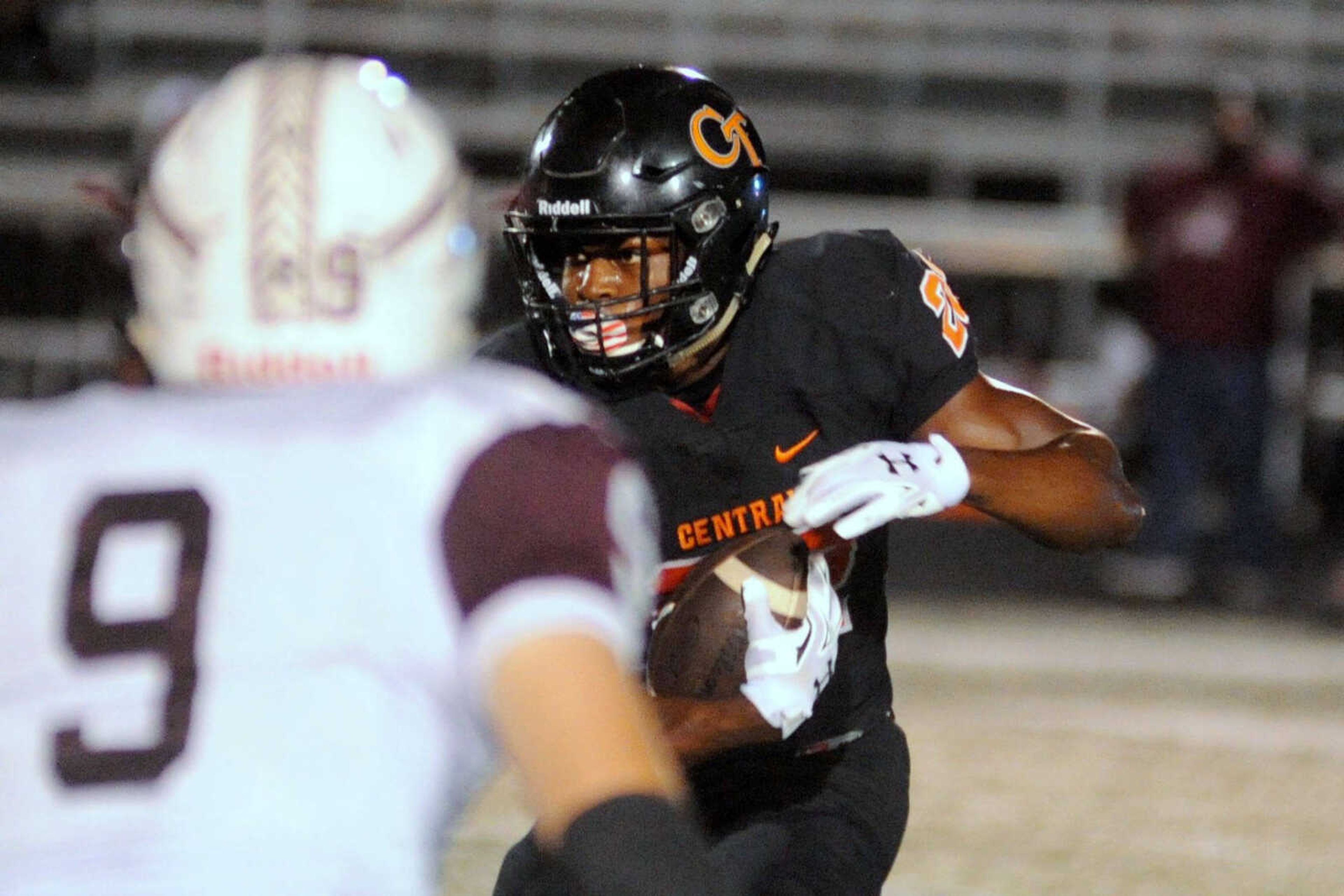 Cape Central's Aaron Harris carries the ball against St. Charles West on Friday, August 26, 2016 at Cape Central High School. (Trent Singer)