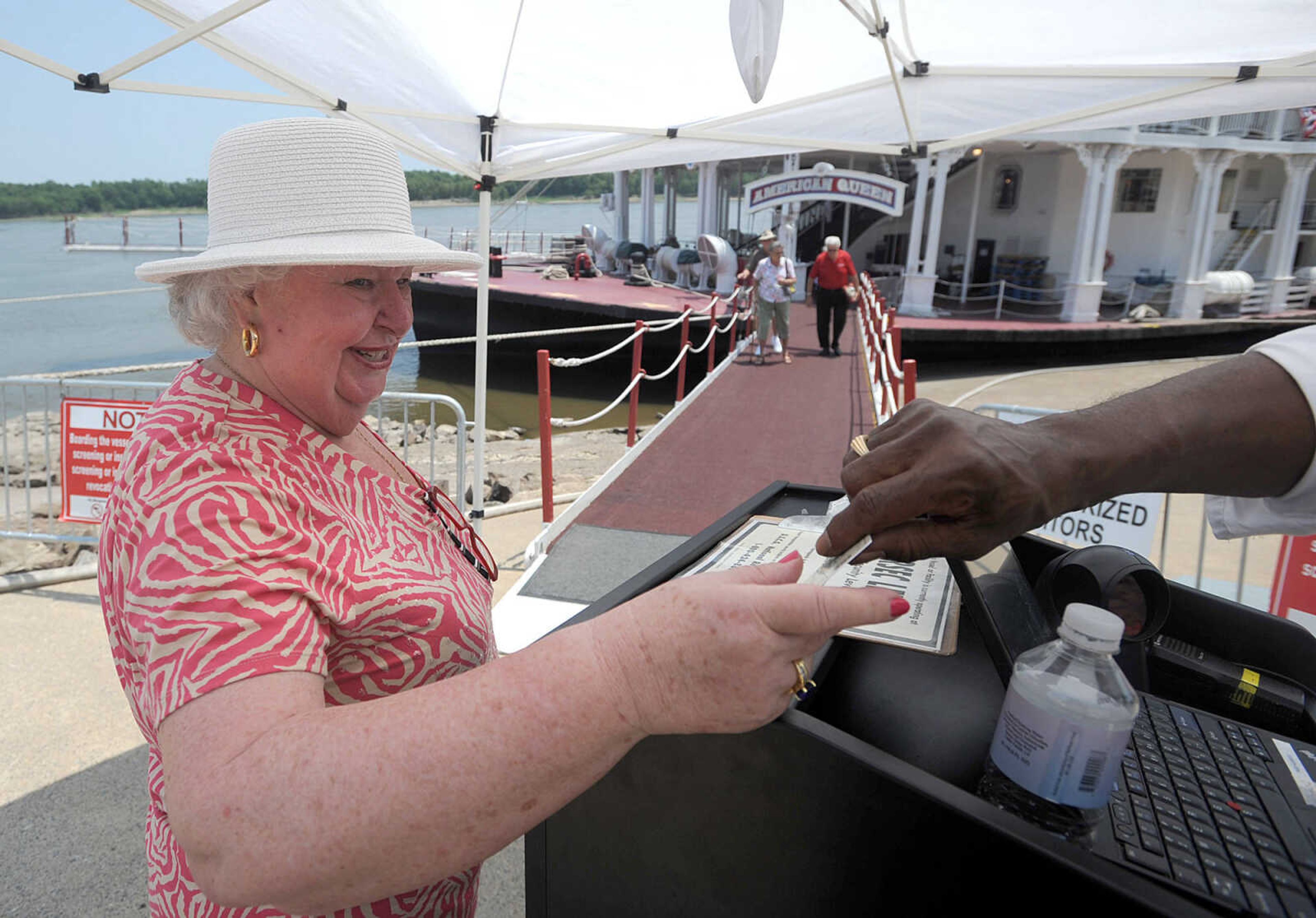 LAURA SIMON ~ lsimon@semissourian.com
A passenger prepares to board the American Queen Monday, July 2, 2012 in downtown Cape Girardeau.