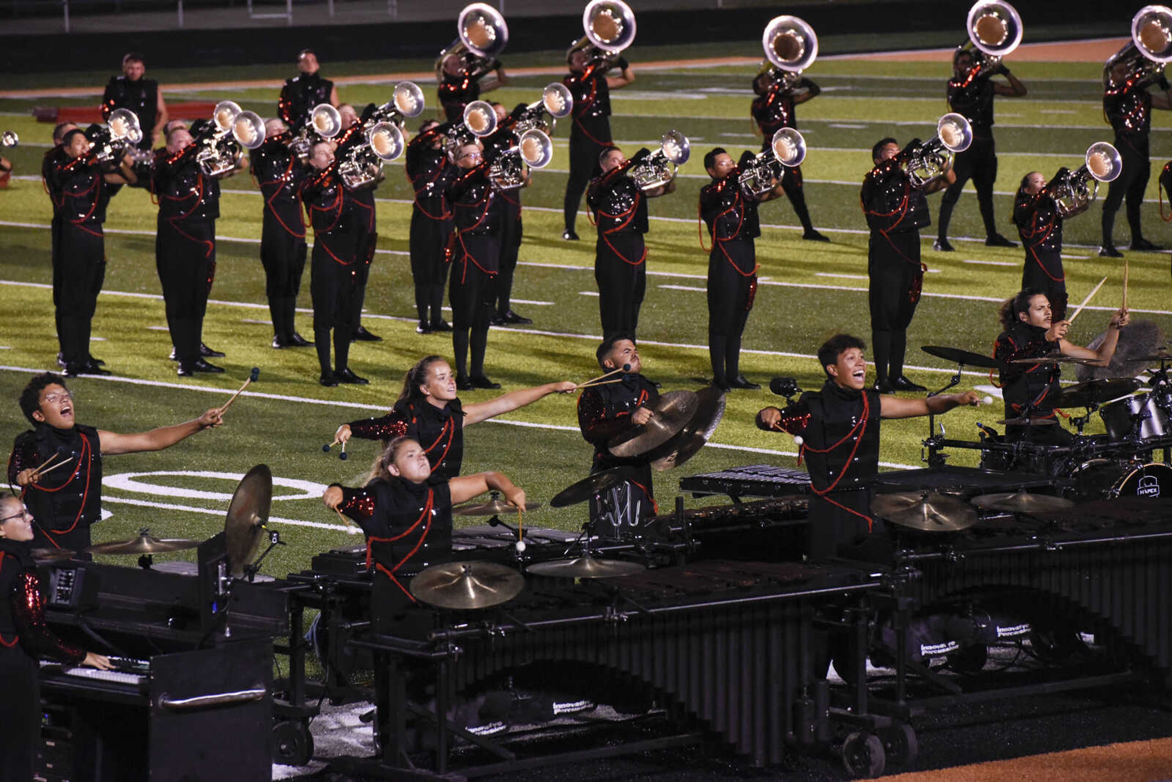 Mandarins from Sacramento, California perform during the Drum Corps International program "Drums Along the Mississippi" at the Cape Central High School field Tuesday Aug. 10, 2021.