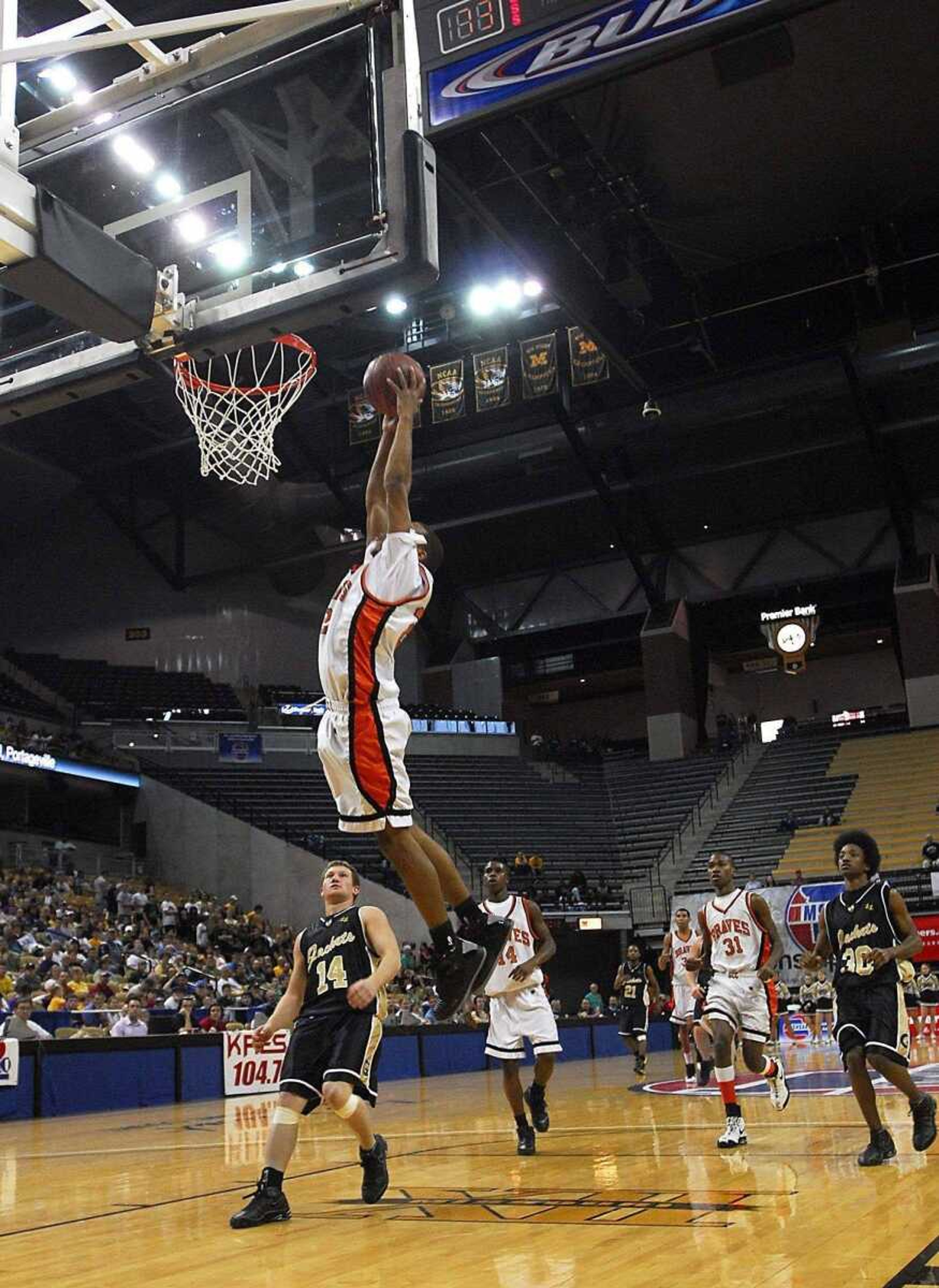 KIT DOYLE ~ kdoyle@semissourian.com<br>Scott County Central's Drew Thomas dunks for two of his game-high 31 points during Thursday's 77-43 victory against Glasgow in their Class 1 semifinal at Mizzou Arena in Columbia.