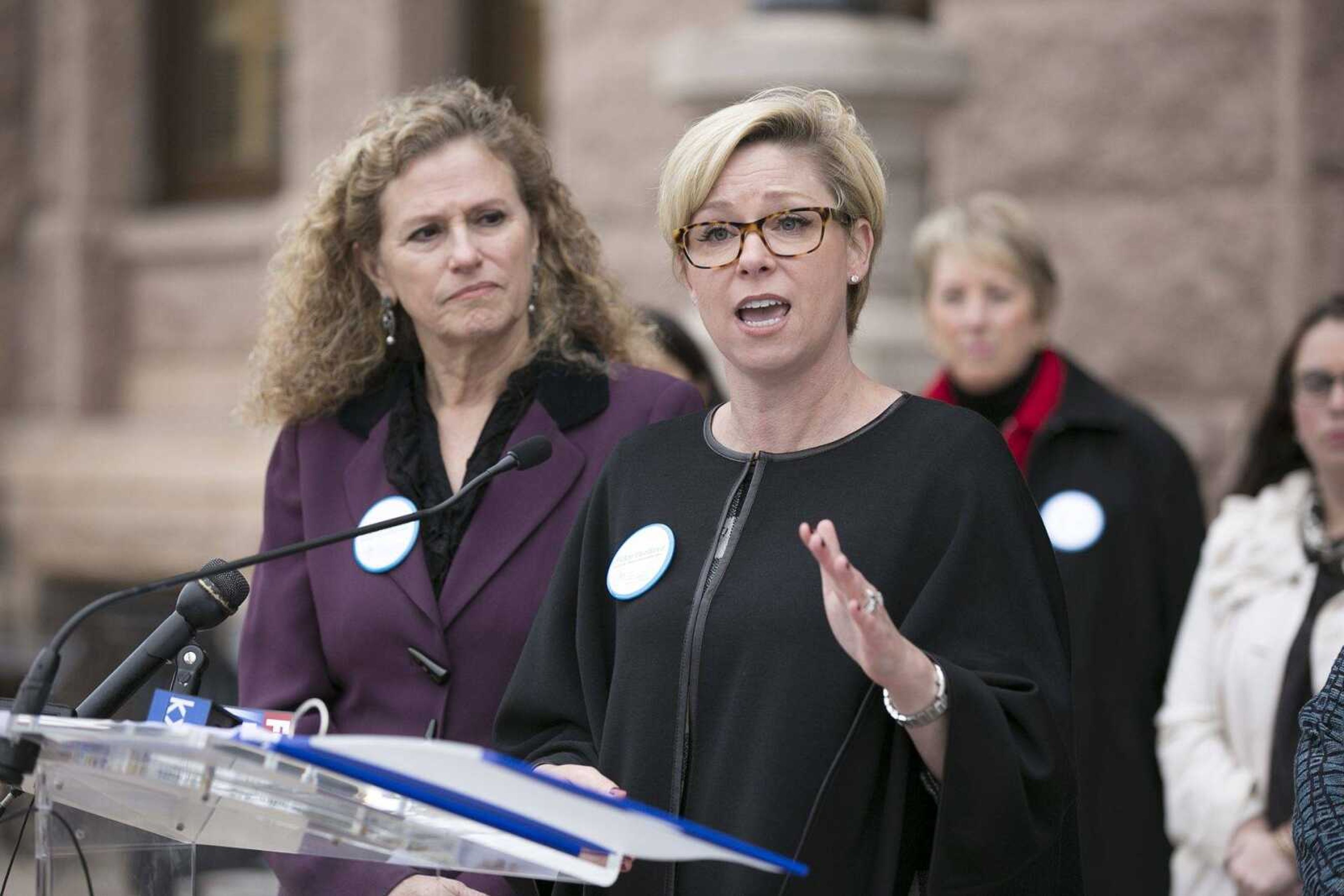 State Rep. Sarah Davis speaks about the vaccination and cancer issues in regards to the HPV vaccine in the state during a news conference Wednesday at the Texas Capitol in Austin. Texas could host the nation's next major fight over stricter requirements for immunizations as its rates of schoolchildren who refuse to get shots for non-medical reasons rises.