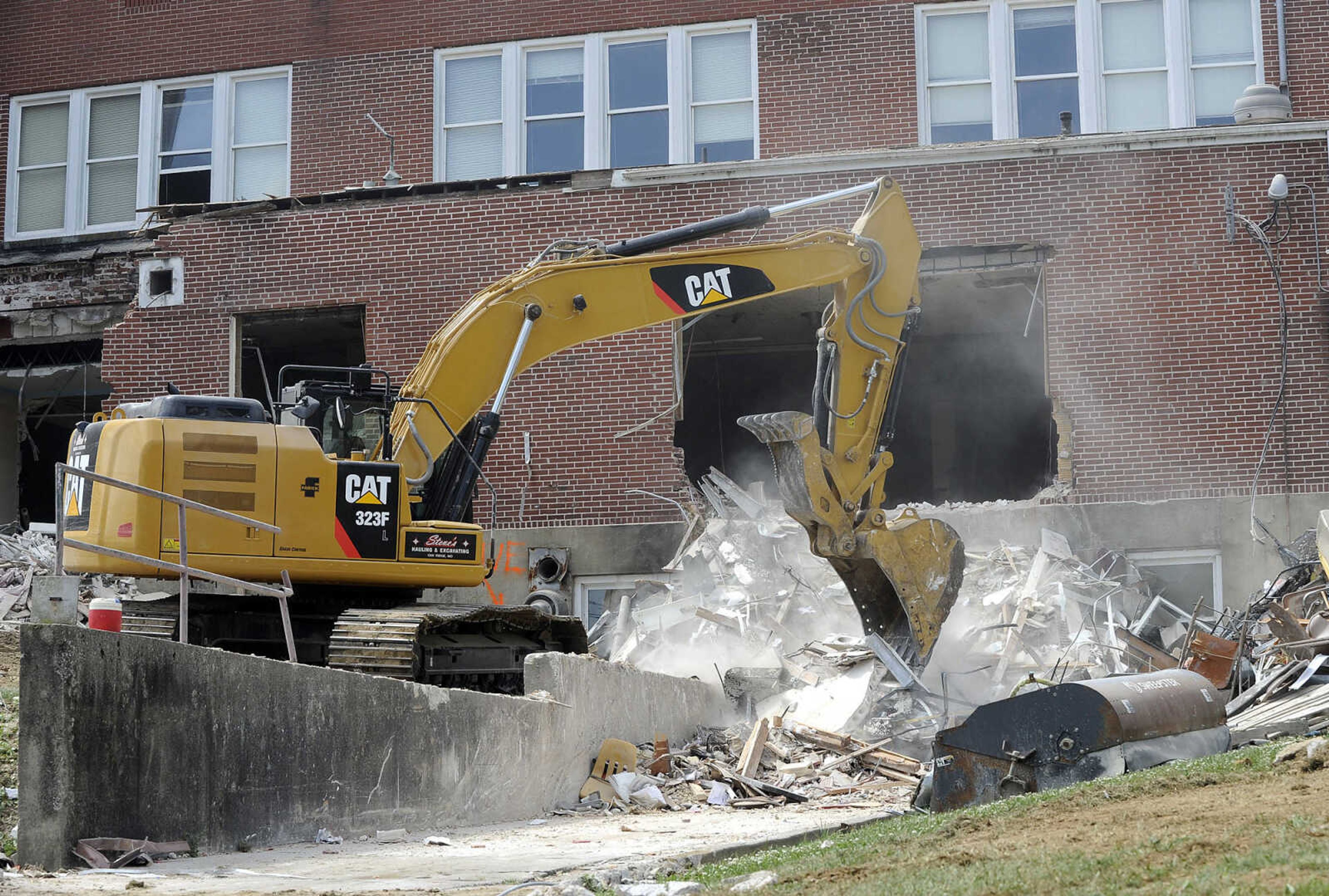 FRED LYNCH ~ flynch@semissourian.com
Demolition of the "Old A" high-school building is underway Wednesday, June 14, 2017 at Jackson High School in Jackson.