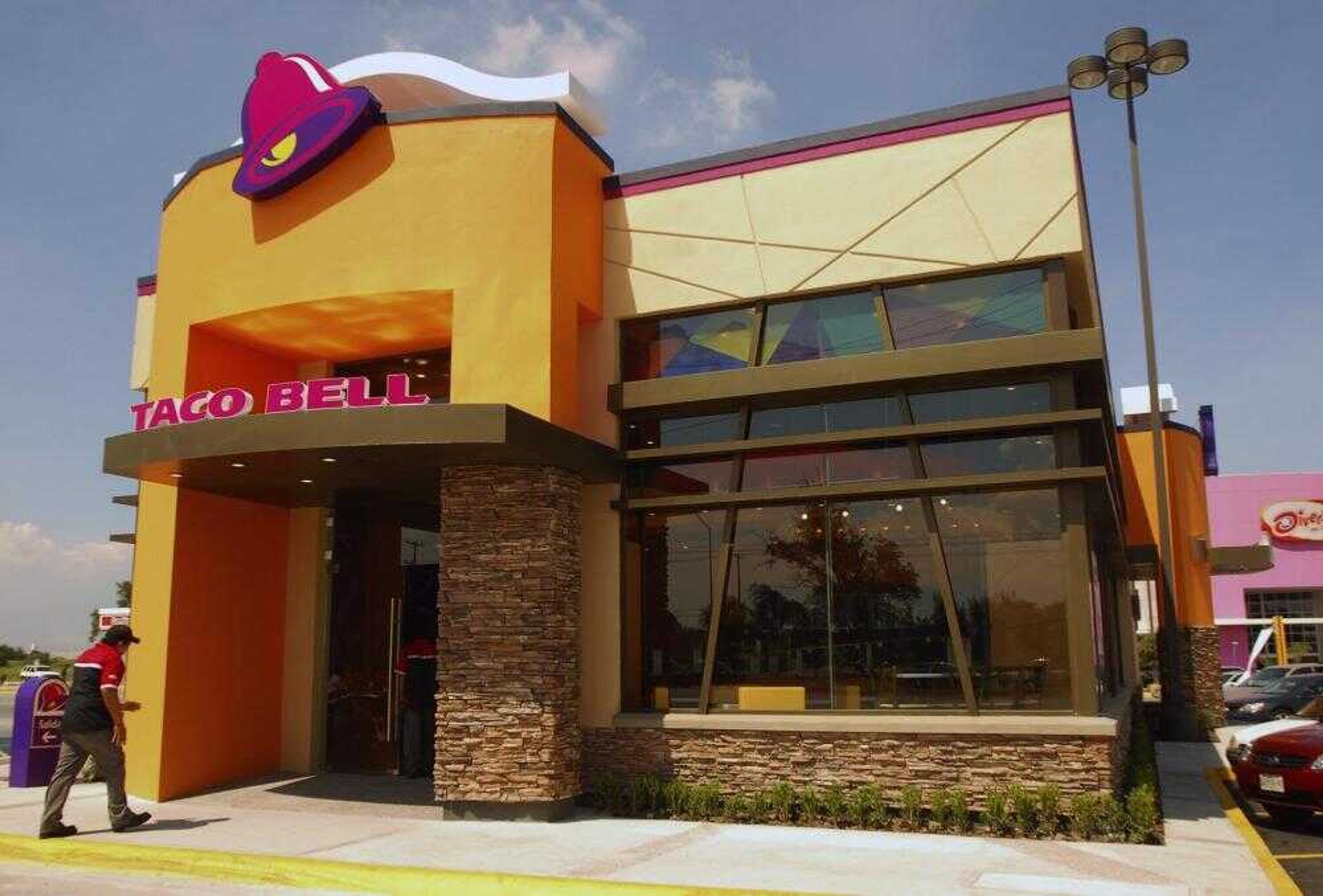 The exterior of a recently opened Taco Bell was seen Oct. 3in Apodaca in northern Mexico. The restaurant chain has added french fries and soft-serve ice cream to its menu south of the border to present a more "American" image. (Monica Rueda ~ Associated Press)