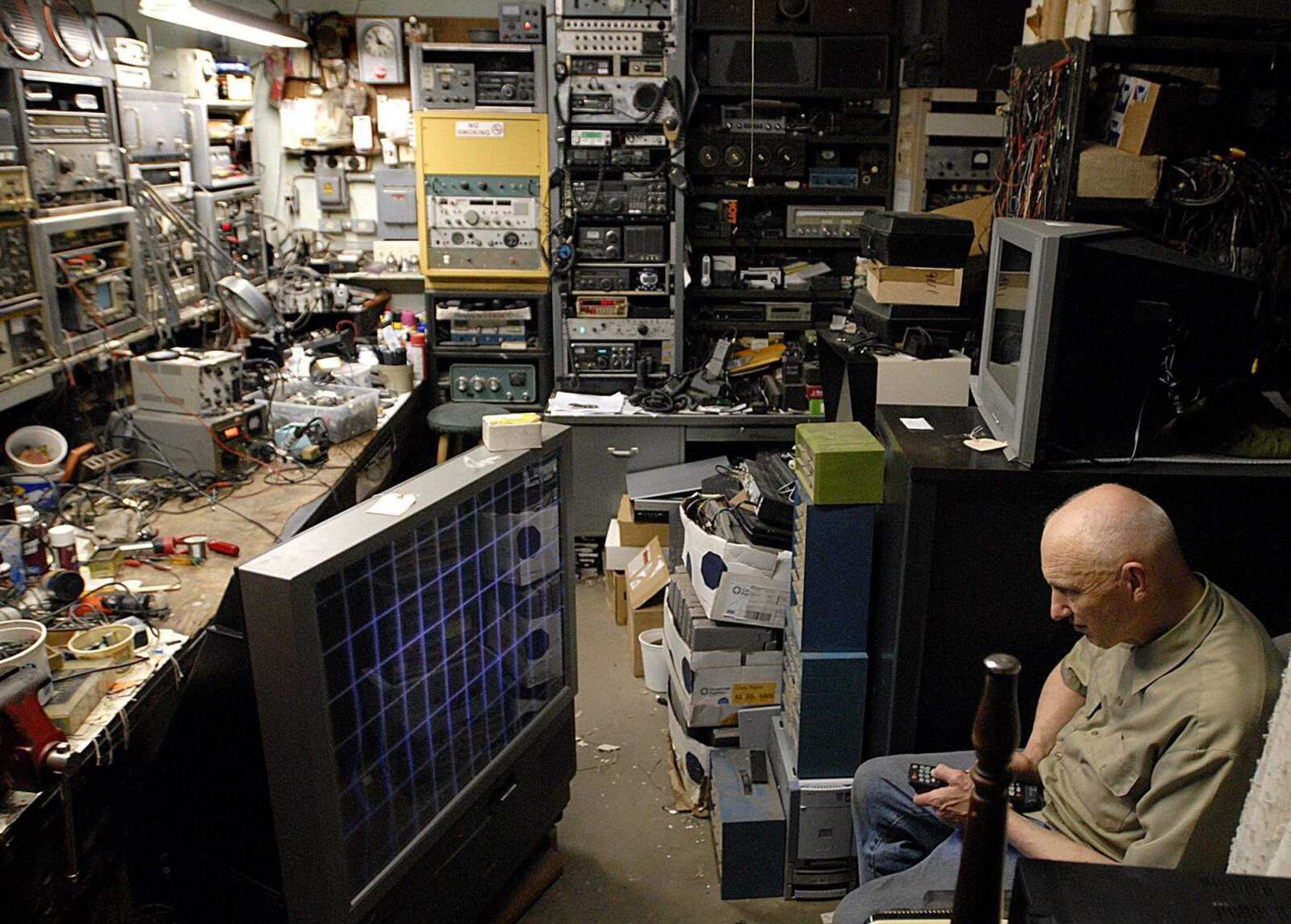 AARON EISENHAUER ~ aeisenhauer@semissourian.com
Joe Lorberg works with a television set in his repair shop at the Lorberg Company on Monday, June 9, 2008.