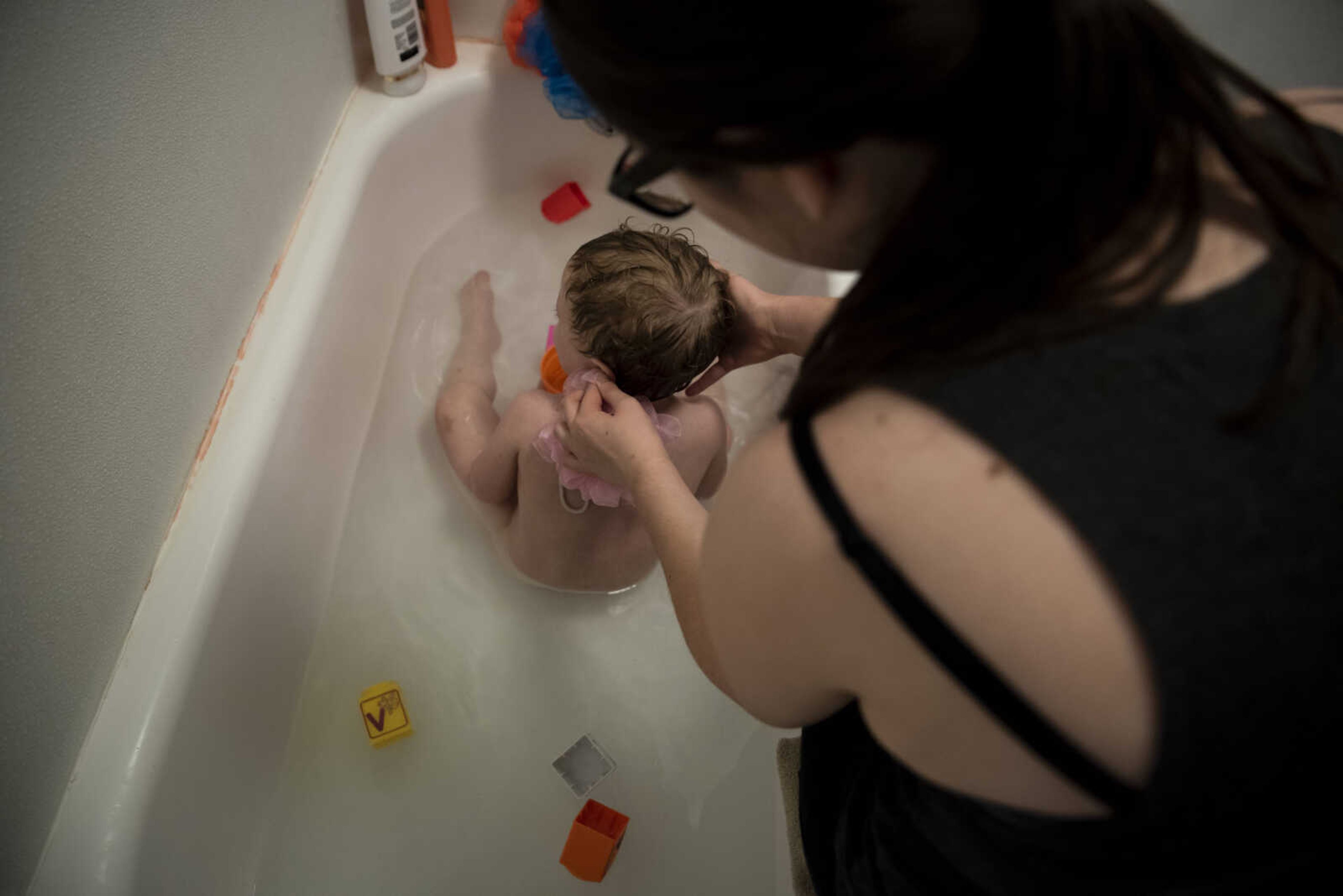 Emily Medlock bathes her son, Phoenix Young, 2, at home Tuesday, May 7, 2019, in Cape Girardeau.