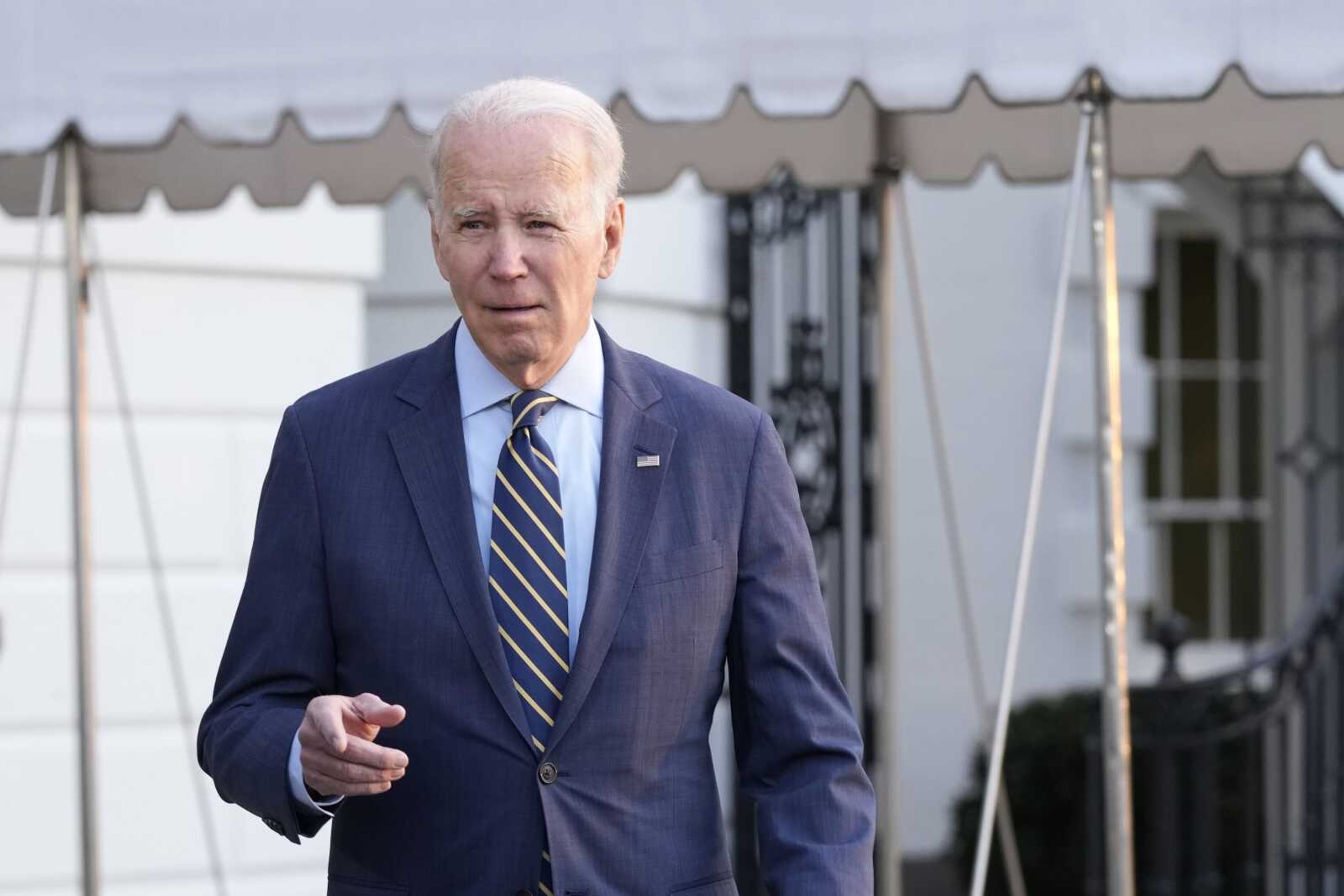 President Joe Biden walks over to talk with reporters before he and first lady Jill Biden board Marine One on the South Lawn of the White House in Washington, Wednesday, Jan. 11, 2023. Jill Biden is having surgery to remove a small lesion found above her right eye during a routine skin cancer screening (AP Photo/Susan Walsh)