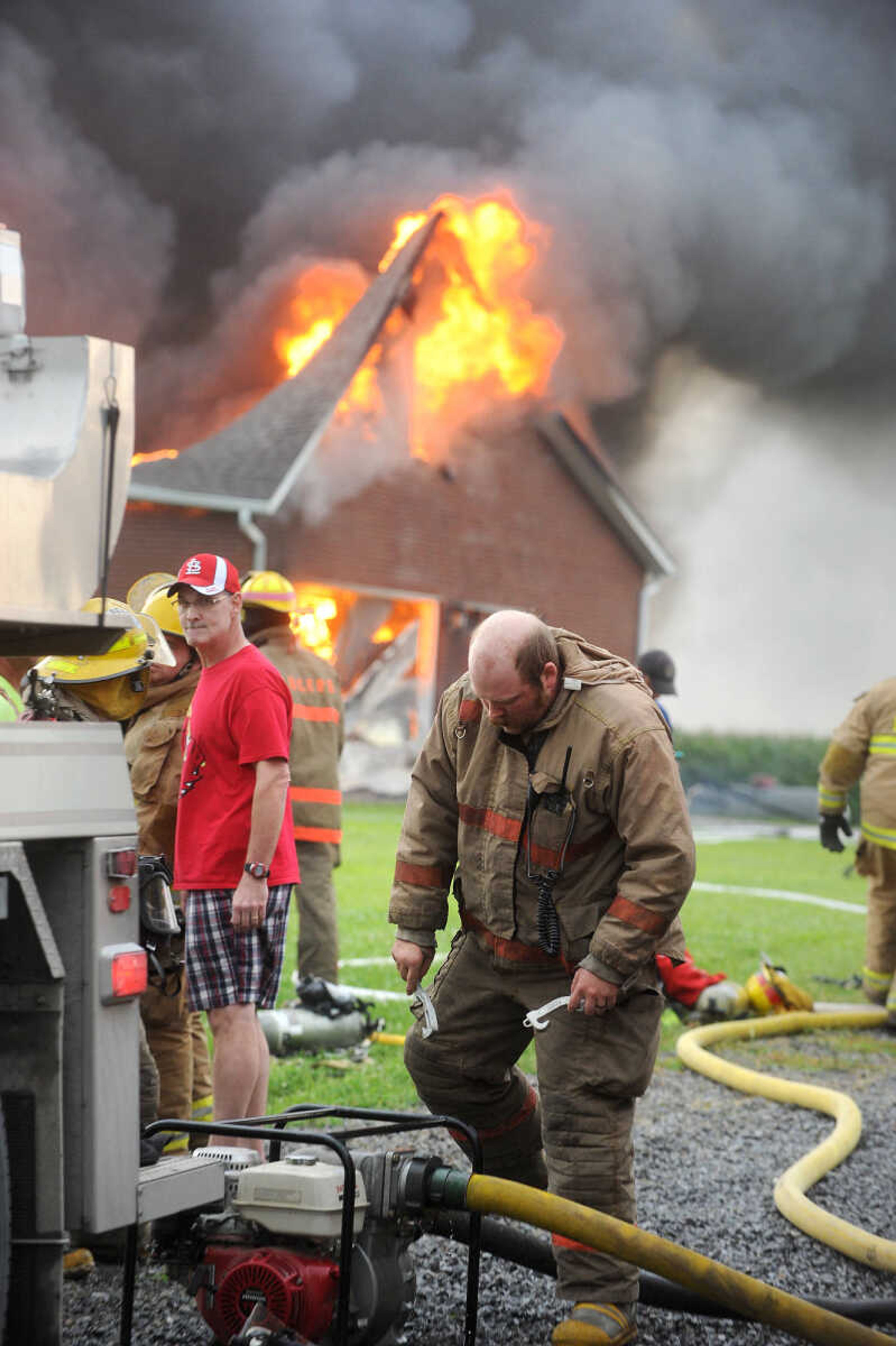 LAURA SIMON ~ lsimon@semissourian.com

Firefighters from Delta, Scott City, Chaffee and New Hamburg/Benton/Commerce battle a house fire off County Road 204 in Scott County Wednesday afternoon, July 23, 2014.