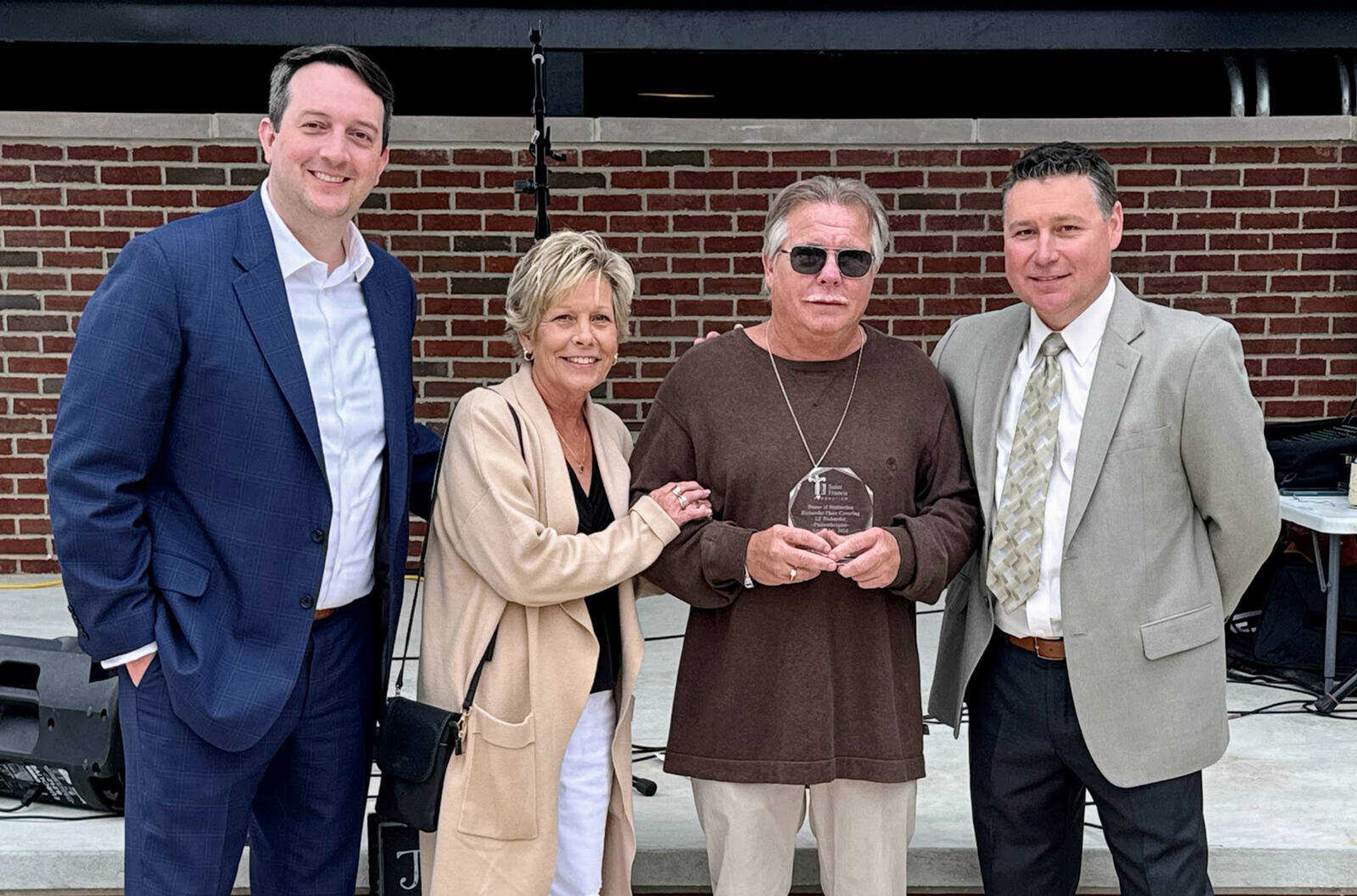 Pictured from left if Garrett Ozbun, Saint Francis Foundation Board President; Robin Sims; Lynn Richardet; and Stacy Huff, Saint Francis Foundation Executive Director.