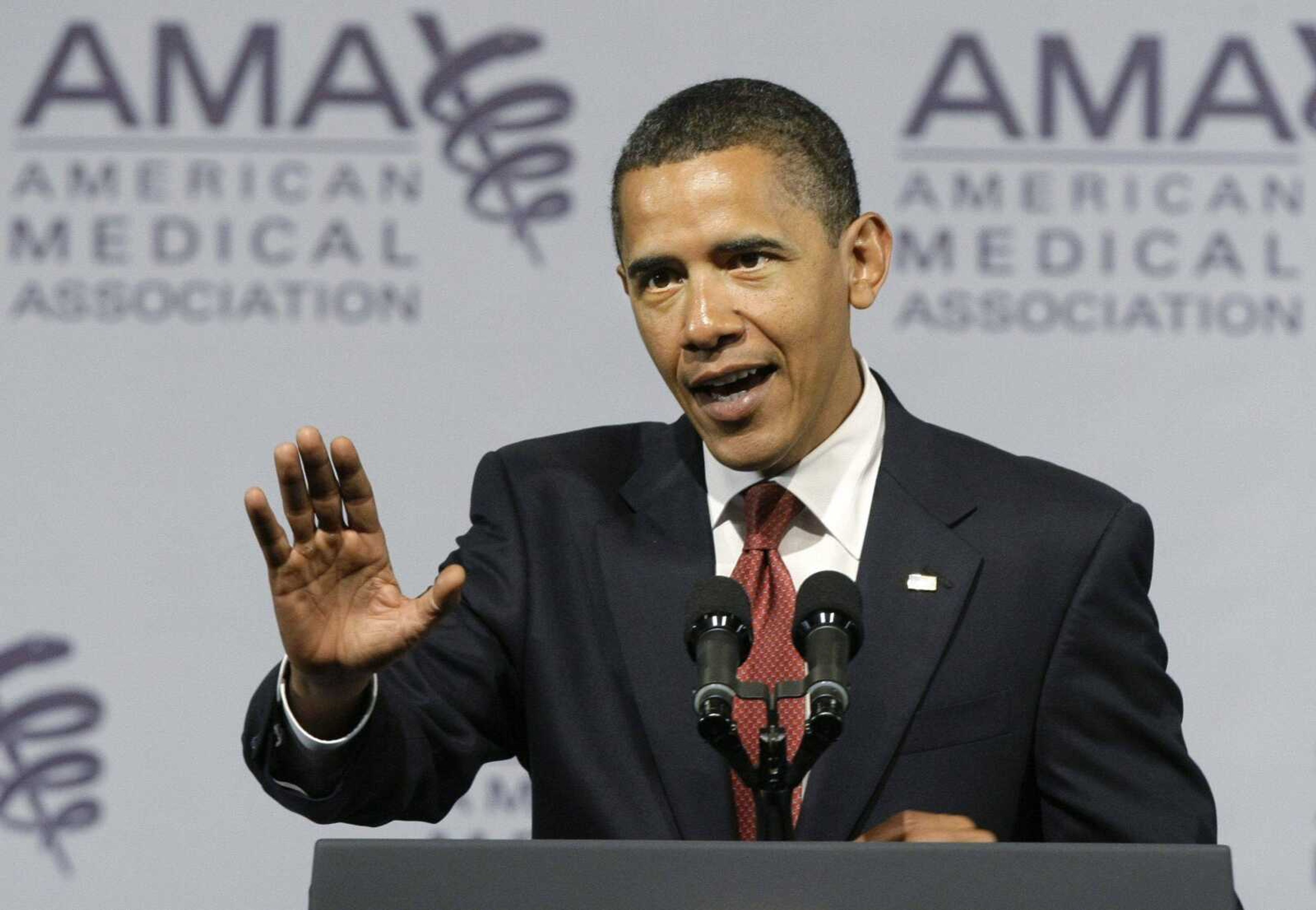 President Obama addresses the American Medical Association on Monday during its annual meeting in Chicago. (CHARLES REX ARBOGAST ~ Associated Press)