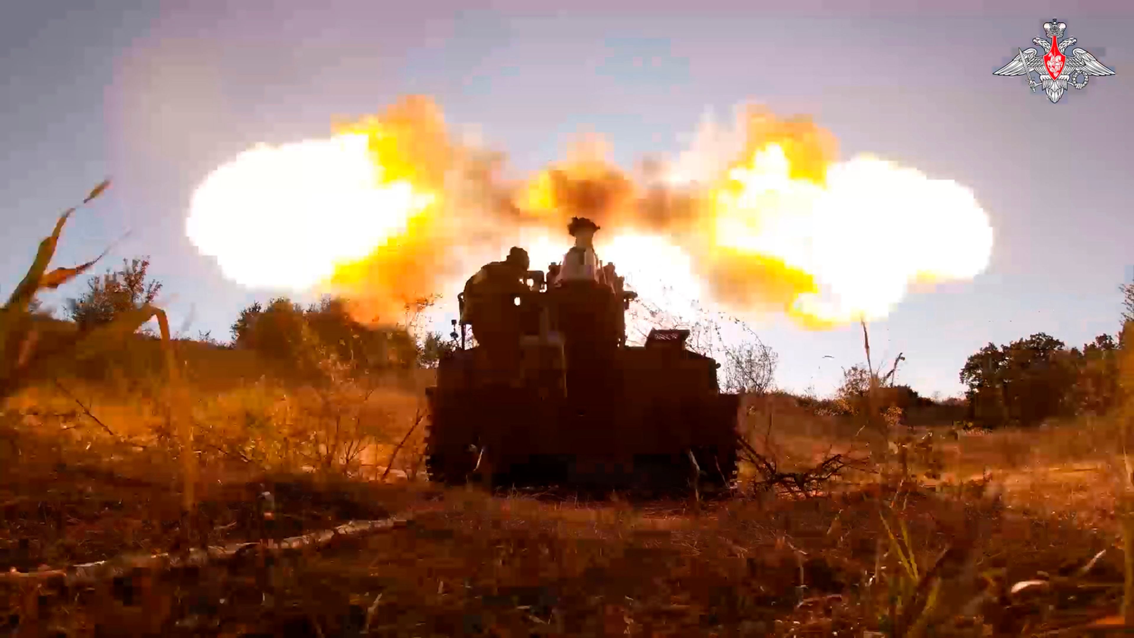 In this photo taken from video released by the Russian Defense Ministry on Sunday, Aug. 18, 2024, Russian soldiers fire Giatsint-S self-propelled gun towards Ukrainian positions at an undisclosed location in the Russian - Ukrainian border area in the Kursk region, Russia. (Russian Defense Ministry Press Service photo via AP)