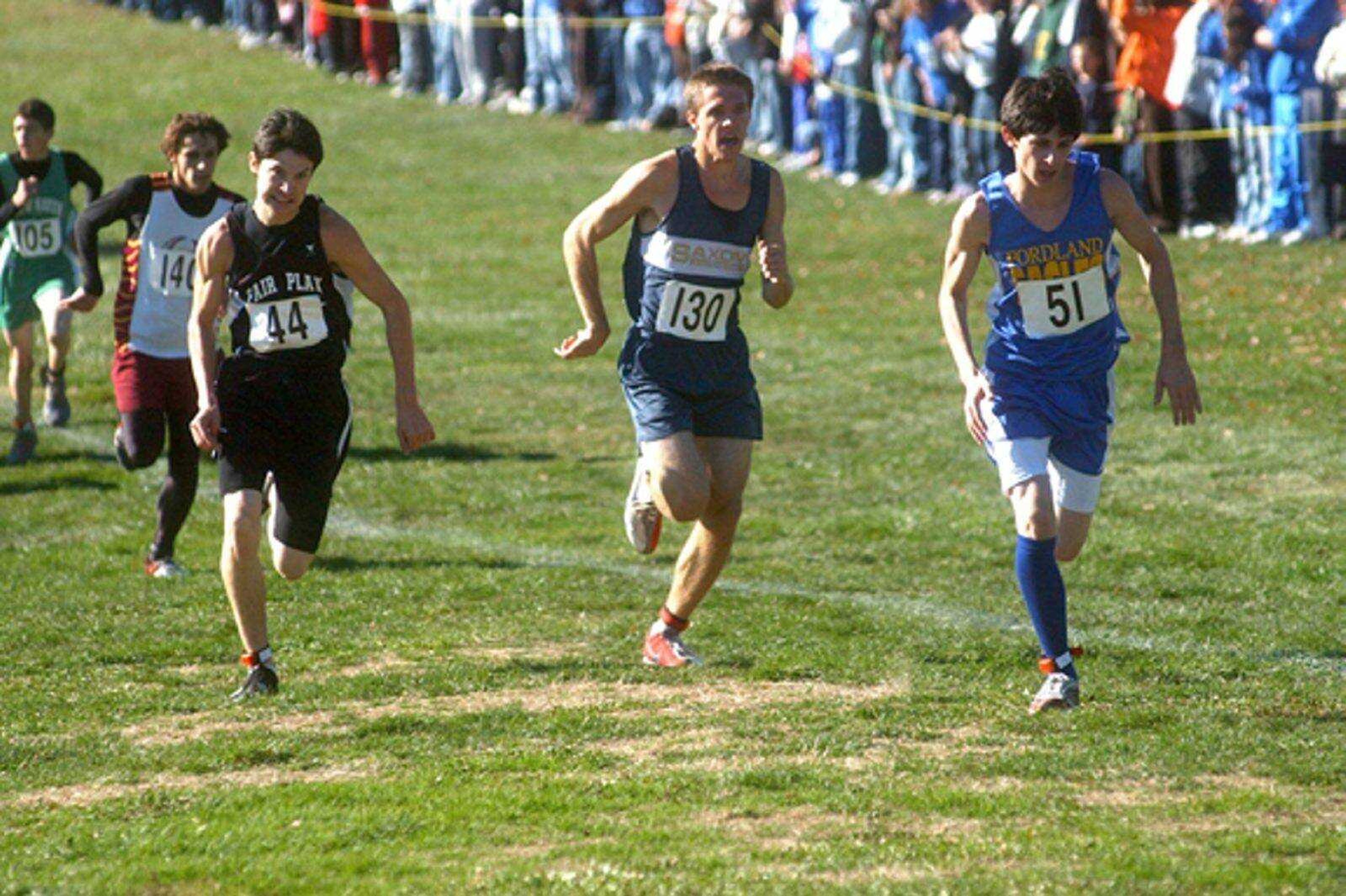 Saxony Lutheran's Max Wieser tried to get past Fordland's Justin Golay (51) while holding off Fair Play's Colten Harris (44) during the Class 1 boys state cross country meet Saturday. (Andrew Jansen ~ Special to the Southeast Missourian)