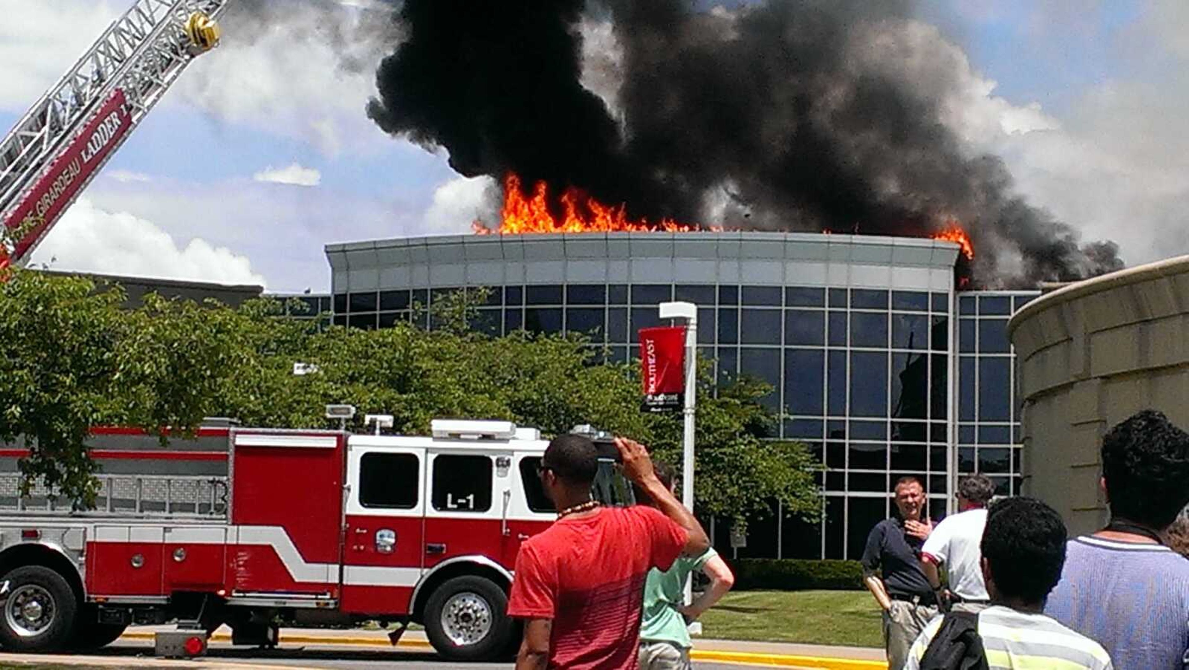 This photo shows a fire on the roof of Dempster Hall at the Southeast Missouri State University campus. The building houses university business programs and some administrative offices. (Submitted by Alicia Lincoln)