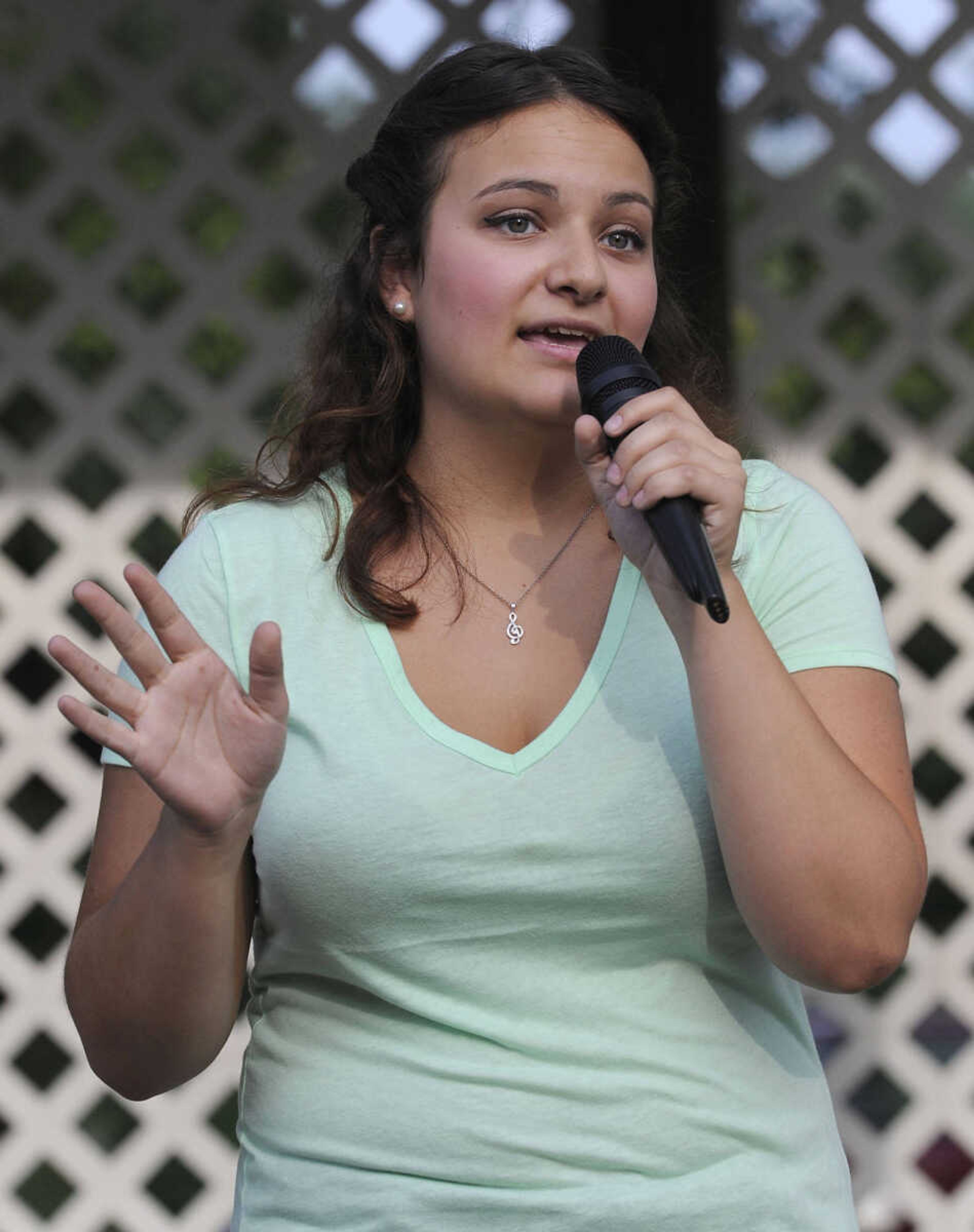 FRED LYNCH ~ flynch@semissourian.com
Mariah Adams performs "Back to Black" in the Heartland Talent Showcase at German Days on Saturday, Aug. 9, 2014 at Frisco Park in Chaffee, Missouri.