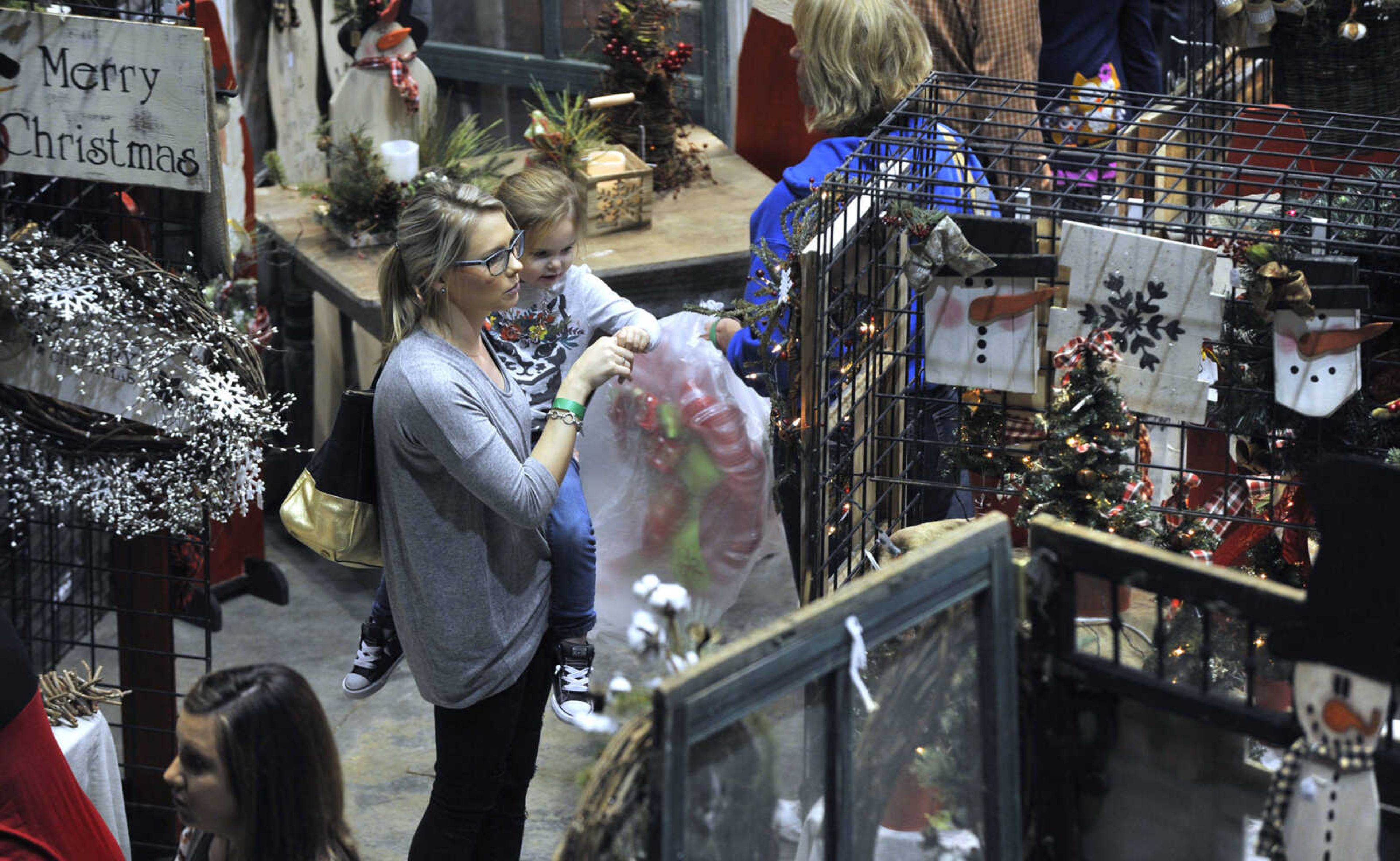 FRED LYNCH ~ flynch@semissourian.com
People look to buy gifts Saturday, Nov. 18, 2017 at the Christmas Arts & Crafts Extravaganza in the Show Me Center.