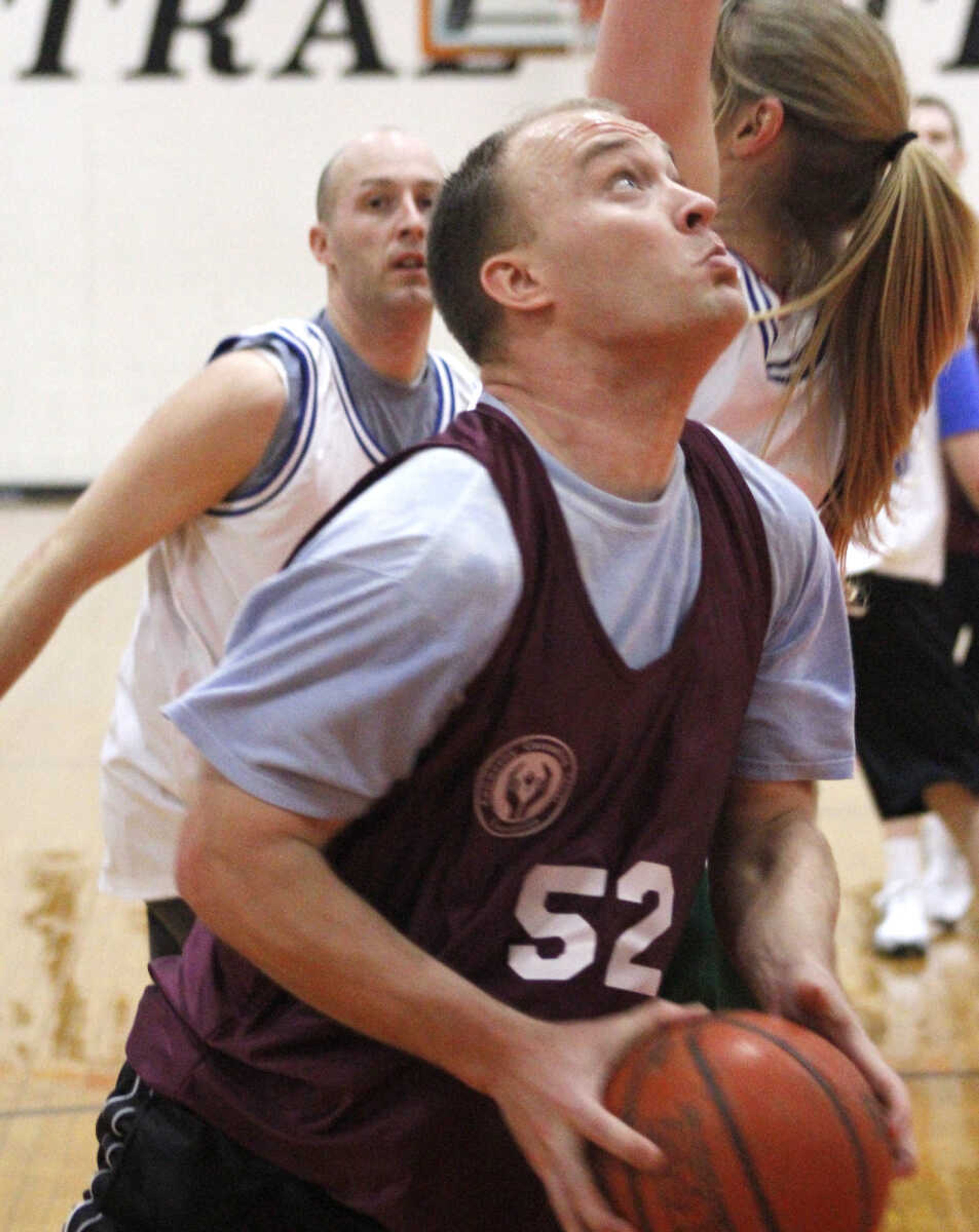 JONATHAN BRIDGES ~ photos@semissourian.com
Andy Rehmer for the Lawyers sets up for a shot. Saturday, March 3, 3012 during the 19th annual Doctors vs. Lawyers basketball showdown at Cape Central Junior High School in Cape Girardeau. Doctors won 84-70.