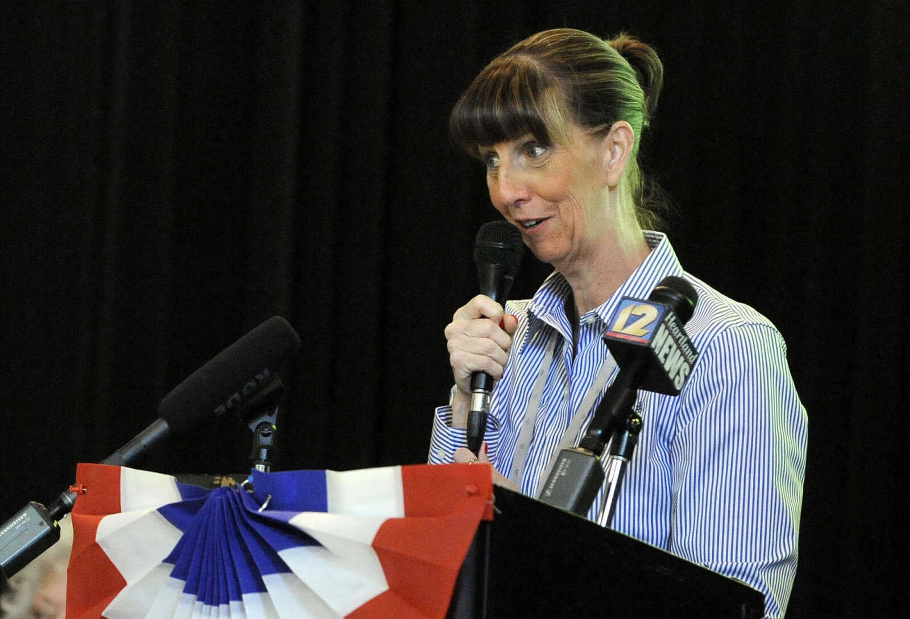 LAURA SIMON ~ lsimon@semissourian.com

Dr. Ruth Ann Orr gives a closing statement on Monday, March 21, 2016, during the living history event honoring the WWII lost crew of the Flying Fortress 812, and the medal presentation to Sgt. Clifford Heinrich at Alma Schrader Elementary. Heinrich was presented with an American Campaign Medal, WWII Victory Medal, Army Good Conduct Medal, a WWII Lapel Button, European-African-Middle Eastern Campaign Medal and the Purple Heart for his service during WWII during Monday's presentation.