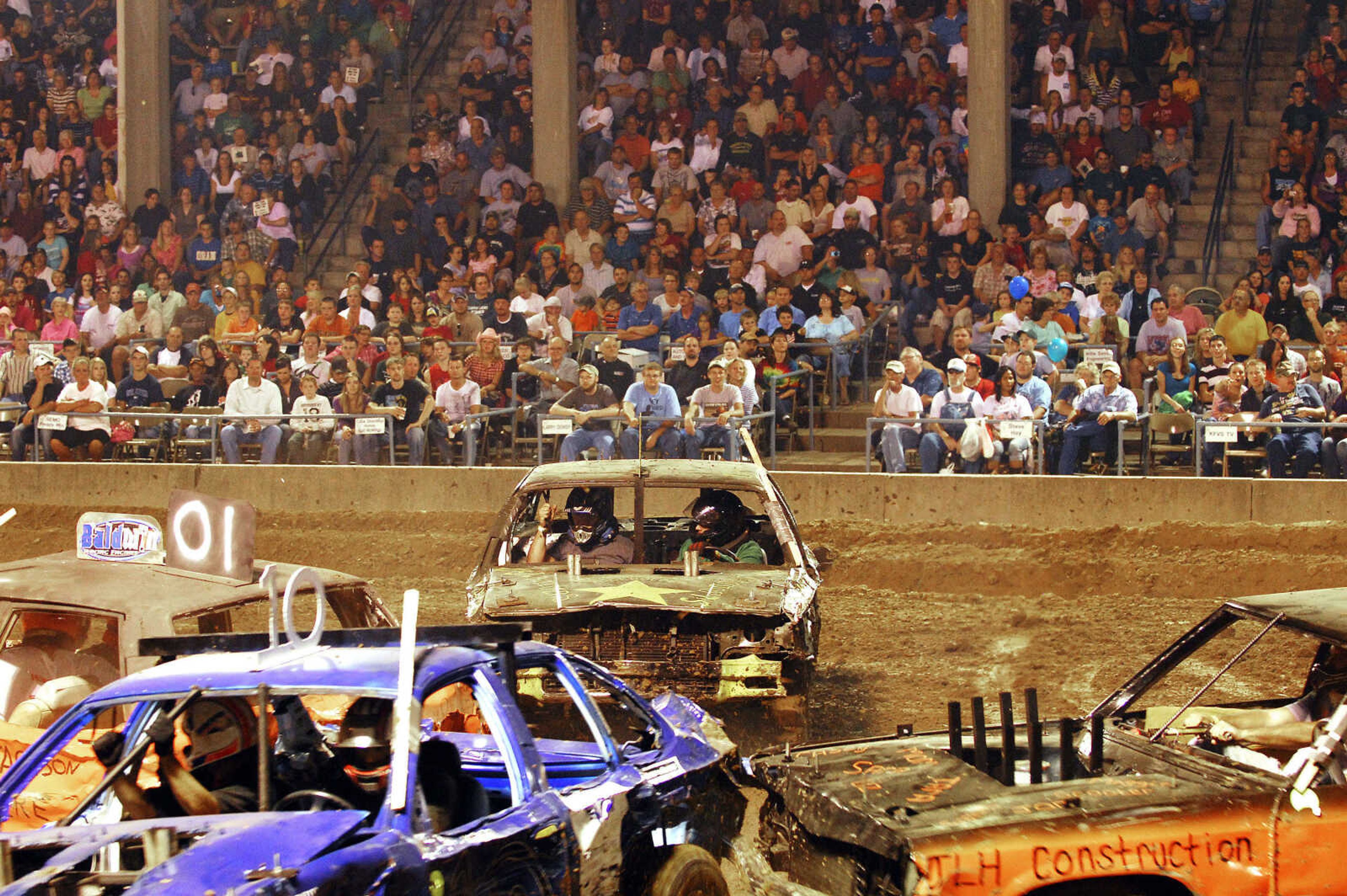 LAURA SIMON~lsimon@semissourian.com
The The grandstand at Arena Park was sold out for the Dual Demolition Derby Tuesday, September 14, 2010 during the 155th Annual SEMO DIstrict Fair.LAURA SIMON~lsimon@semissourian.com
The dual demolition derby at the 155th Annual SEMO District Fair Tuesday, September 14, 2010.