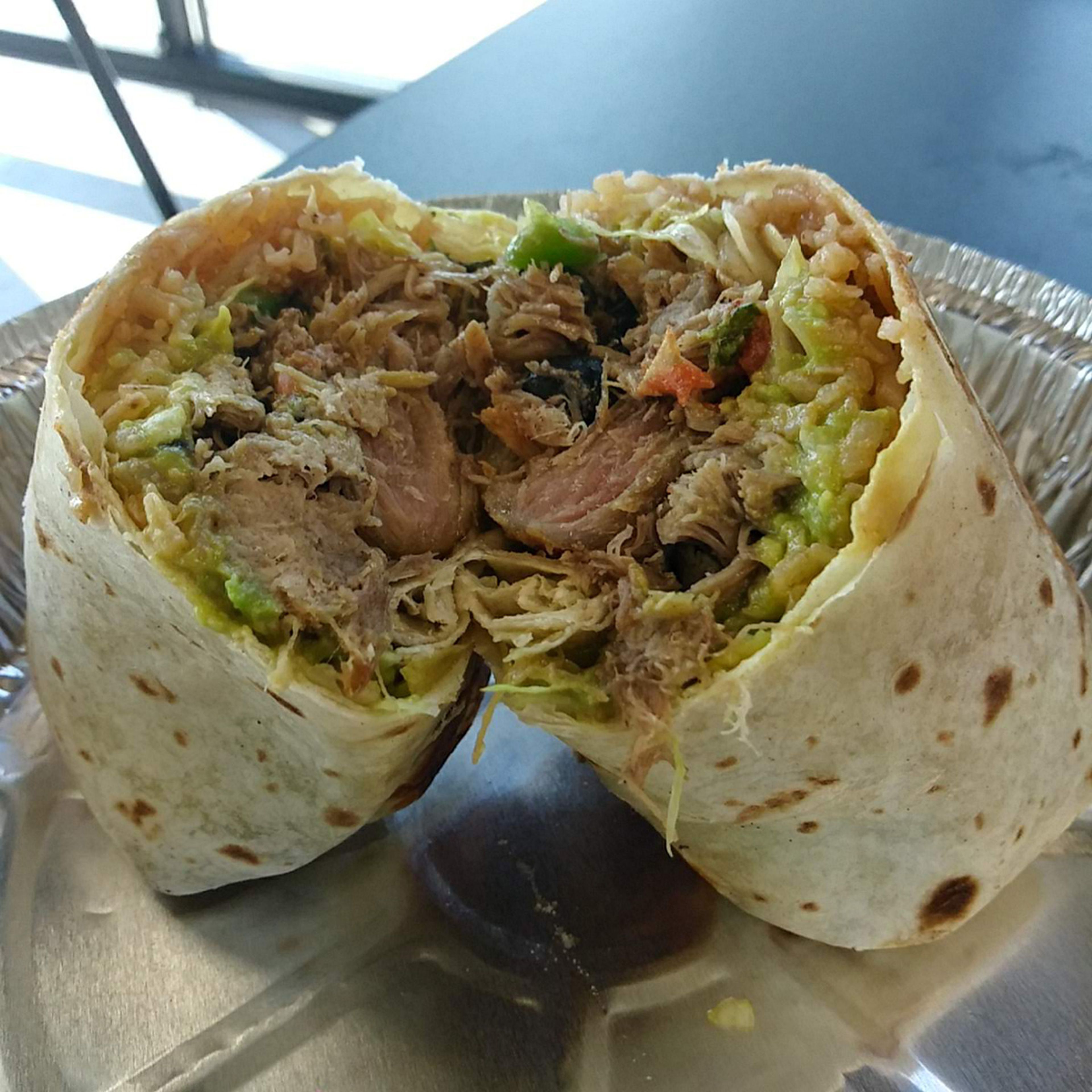 The Burrito Mario, full of tender carnitas and enough food to satisfy.